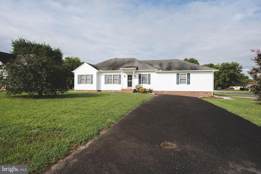 This conveniently located ranch style home is priced to sell and ready for you to drop your boxes! Space for all of your outdoor toys with a two car garage plus two driveways. The home gives a light and airy feeling with the vaulted ceiling in the living room which leads to your spacious kitchen including a kitchen island and separate laundry room. Large master bedroom with attached bath and two additional bedrooms and a full hall bathroom. This could be your's in time to enjoy early fall nights on your back deck! HVAC is only 2 years old!