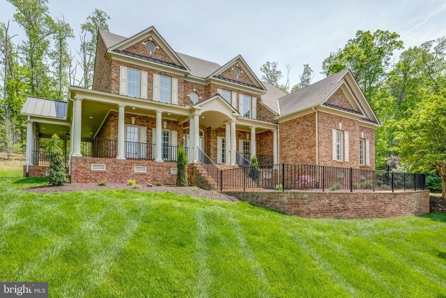 Stately Custom Colonial in Sought-After Tarrington. Situated on a private cul-de-sac lot, this custom Boone-built colonial blends timeless elegance with functionality & warmth. A sweeping wraparound front porch welcomes you, seamlessly connecting to a charming side porch complete with a ceiling fan and sun-protection awning—an ideal spot to relax & enjoy stunning sunset views. Inside, beautifully appointed formal LR and DR showcase gleaming hardwood floors, architectural posts, and extensive dentil molding that reflect the home's classic craftsmanship. The inviting FR, bathed in natural light from expansive windows, features custom built-ins and a cozy double-sided fireplace that flows effortlessly into the open, eat-in kitchen. Designed for both everyday living & entertaining, the kitchen boasts SS appliances, granite countertops, and a spacious layout perfect for gathering. An adjacent office or sitting room, bright and welcoming with its own fireplace, offers direct access to the side porch. Upstairs, the peaceful primary suite provides a true retreat, featuring two walk-in closets and a luxurious ensuite bath with a walk-in shower, jetted tub, and dual vanity. A private sitting room off the primary suite adds flexibility as an additional workspace, exercise room, or relaxing lounge. Three additional bedrooms with newly installed carpet, two full bathrooms, and a versatile loft space complete the 2nd floor, while the 3rd floor offers a finished bonus area w/a full bath. Recent improvements include 3 NEW CARRIER HVAC UNITS, NEW HARDWOODS throughout the 2nd floor, NEW CARPETING in all of the bedrooms, NEW UPDATED LOW MAINTENANCE LANDSCAPTING with uplighting and a NEW FRENCH DRAINAGE system in the backyard with tied-in gutter downspouts and NEW/NEWER APPLIANCES.  Tarrington offers an unparalleled lifestyle with resort-style amenities. Combining refined living spaces with exceptional community features, this home presents a rare opportunity to experience one of Midlothian’s most sought-after neighborhoods.