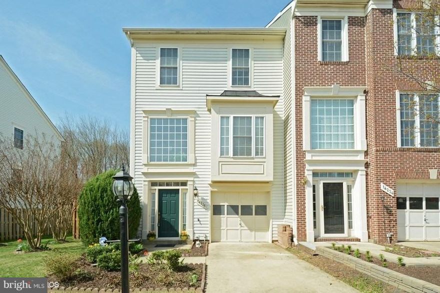 GORGEOUS END UNIT GARAGE TOWNHOME. High ceilings. Bright & sunny. Lots of windows. Updates galore - new paint throughout. Spacious Living/Dining with gas fireplace & new wood floors. Large Rec area with new floor. Kitchen w/ new Stainless Steel appliances & Italian floor.Deck & large fenced yard backing to woods. Minutes to shopping, restaurants, Malls & I-95. Great community amenities. A MUST SEE