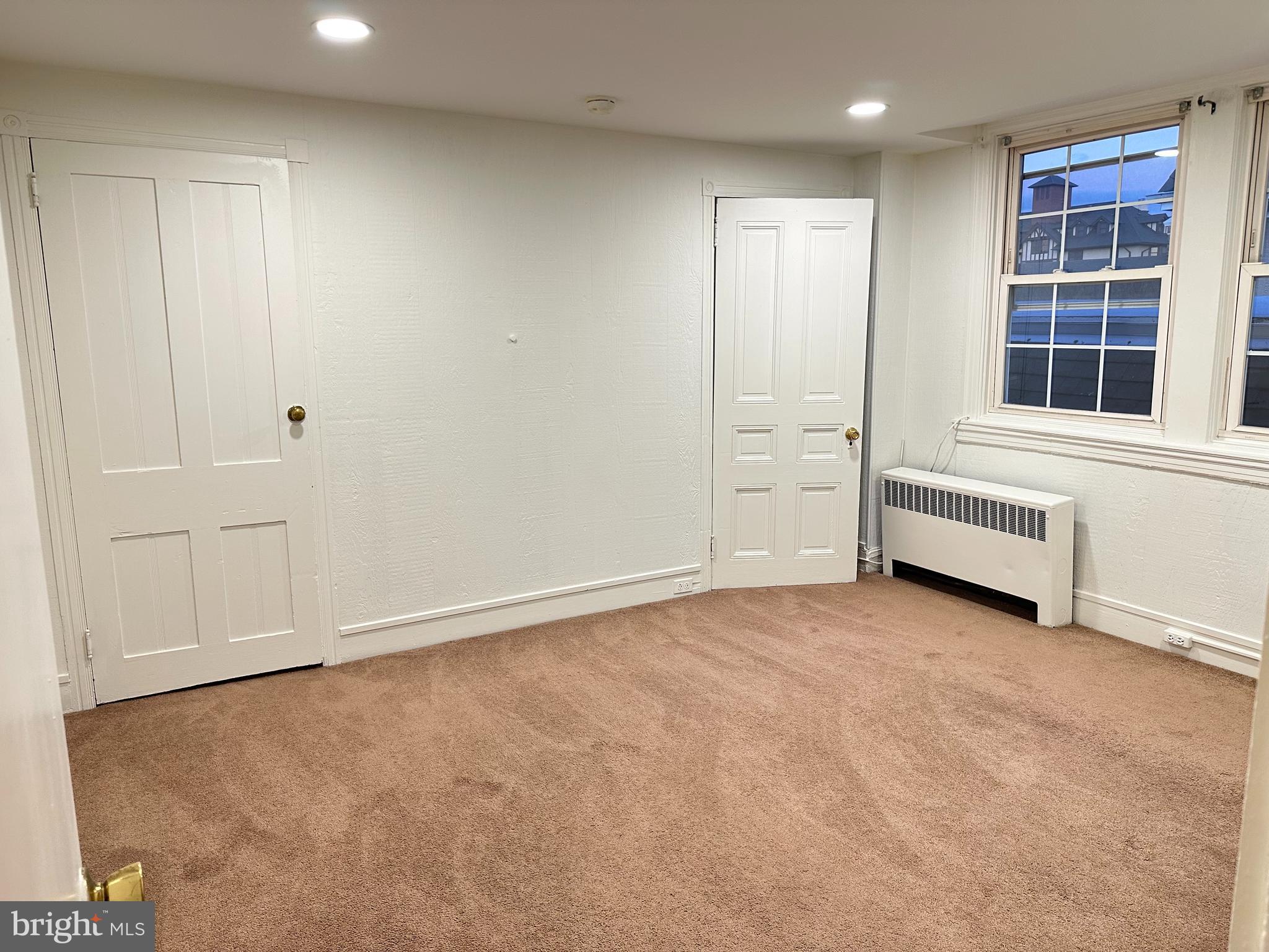 102 School Lane is quite literally steps from some of the best restaurants Downtown Wayne has to offer: The Goat's Beard, The Blue Elephant, and Christopher's to name a few. You're within walking distance to the Wayne Septa Train Station and can be in Philly in under an hour. This apartment is located on the third floor with private parking. There is one spacious bedroom plus a separate room that would be considered the living room or possibly a second bedroom. The bathroom has been completely remodeled with a tiled shower and a new vanity. The unit is complete with a brand new washer and dryer in the kitchen for convenience. Included in the rent are the following utilities: water, sewer, trash, heat, leaving the tenant responsible for only electricity and wifi.