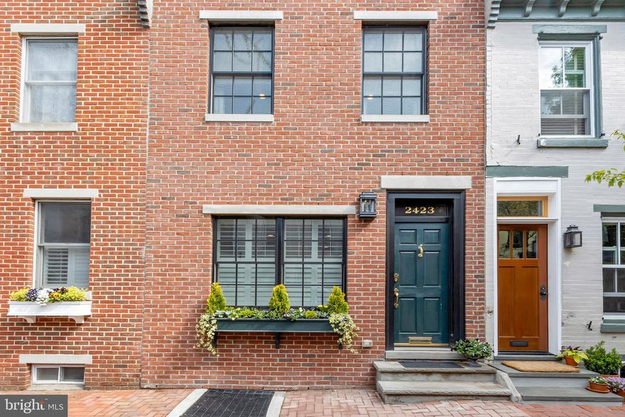 This gorgeous home on one of the most picturesque and quiet blocks in Fitler Square was finished as new construction approximately four years ago!  The first level features rich hardwood floors, recessed lighting, moldings and a a gas fireplace, a living room (wired for a TV) and dining area, and a state of the art open kitchen with granite counters, white shaker cabinets, a Wolf cooktop and double wall oven with convection, microwave drawer, Sub-Zero fridge and  Bosch dishwasher.  The kitchen has sliding doors leading out to a perfectly situated backyard where you can cook (with gas line for a grill) and eat al fresco. The second level of this home has a front bedroom which is currently being used as a quiet and private home office, a clean white and bright full bathroom with subway tile and tub, and a second bright bedroom with two windows.  The third level is where you will find the main bedroom suite, with a large walk in plus additional closet and the luxurious bathroom with a double vanity, excellent storage, an elegant free standing tub,  and a large walk in rain shower, with a frameless shower door.  The top floor with the convenience of an additional sink has a door leading to a roof deck with a breathtaking view of Center City Philadelphia.  The lower level of this home has been finished as a cozy family/workout room with in-wall speakers as well as a full bath.  This floor is perfect for an au pair or overnight guests.  Fitler Square, with its proximity to Rittenhouse Square and University City, has quietly become of one if not the most sought after locations in the city.   Walk to the Schuylkill River Park with the biking trails, dog parks and playground and you will easily see why this is so. You will want to live here too!