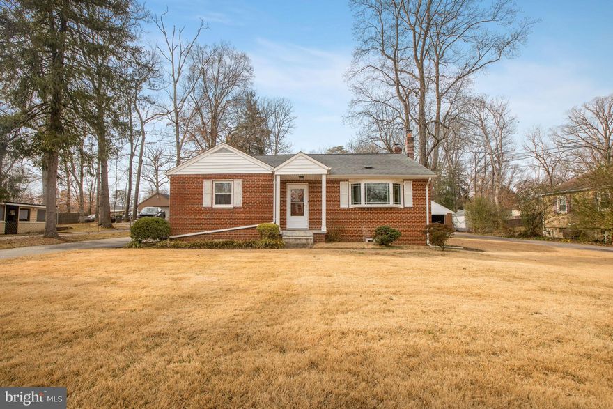 Get this one at this current bargain price before the seller receives a tax refund! The seller has stated they may perform some upgrades and will adjust the price to reflect any upgrades made. So much roominess in this all-brick rambler-style home. Large country eat-in kitchen, Extra-large living room with beautiful Bay window with two Bedrooms, community bath, whole house attic fan, and original wood floors on the main level. The lower level boasts a beautifully finished "nice" sized family room with an attractive free-standing wood stove, a dry bar, another extra-large bedroom with a second full bath with a jacuzzi tub, and a Bonus room with French doors that can be utilized as 4th bedroom, office, the owner had as a media room. Laundry on the lower level. The front and back yard have ample entertaining room and a marvelous “Wrap- Around" driveway that can park 10+ vehicles with a detached garage. One year home warranty will be conveyed at settlement. Don’t miss this true diamond in the rough. The seller has lived in this home for 18 years, is nonsmoking, and the home is pet free. Sold AS-IS with no warranties, guarantees, or repairs.  Noted updated features are:  The roof was replaced in 2005, Oil Tank in 2016, Windows in 2005, the Hot Water heater in 2022, the HVAC is serviced yearly,  a New front storm door and steel back door in 2019, and the New mailbox with solar light in 2021