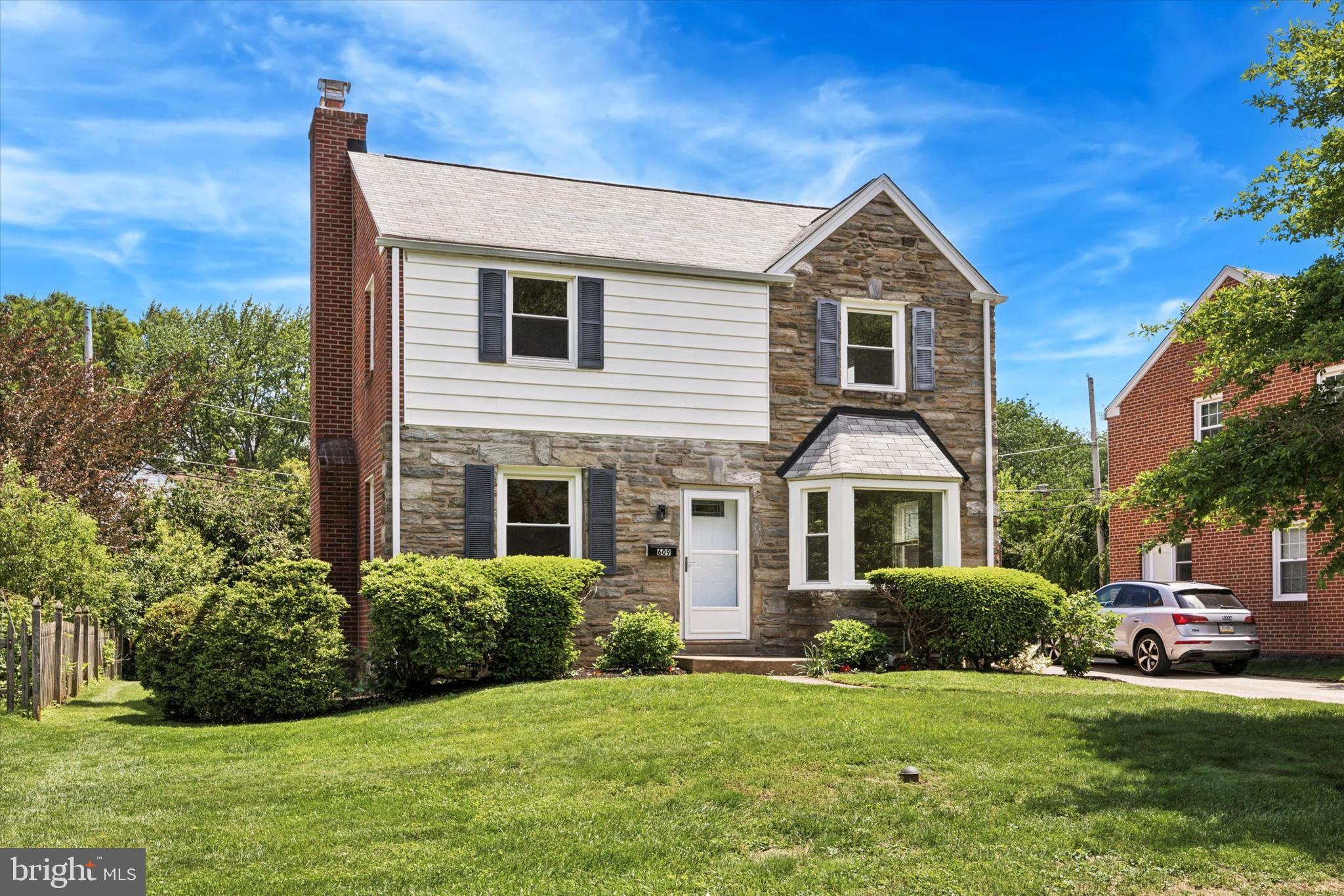 Discover the beautifully renovated home at 609 Latham Road in Wynnewood! This two-story residence,has 3 bedrooms and 2.5 bathrooms, and has undergone a major renovation in 2024-2025, blending its inherent charm with modern updates. Enjoy beautiful newly refinished hardwood floors throughout much of the living areas. The newly renovated kitchen, features stainless steel appliances, a gas cooktop, and granite countertops, perfect for both cooking and casual dining. Relax in the cozy living room with a wood-burning fireplace , enhanced by the recent updates. The half bath is located on the main level. Upstairs, find a comfortable master bedroom, along with an additional two bedrooms, one of which opens onto a lovely deck with a new roof, ideal for outdoor enjoyment. The thoughtfully renovated spaces include multiple well-appointed two full bathrooms on the upper level. The lower level offers valuable space for recreation or storage, plus laundry facilities, all refreshed during the recent renovation. Outside, the property features a nicely landscaped yard with a patio, and potentially a fully fenced area with mature plantings. You'll also appreciate the convenience of an attached garage/storage area. Located on a quiet, tree-lined street, this home is within walking distance to South Ardmore Park and benefits from the award-winning Lower Merion School District. Enjoy easy access to trains, Suburban Square, Whole Foods, shops, restaurants, and a quick commute to Center City. This home has been meticulously renovated and will not disappoint!