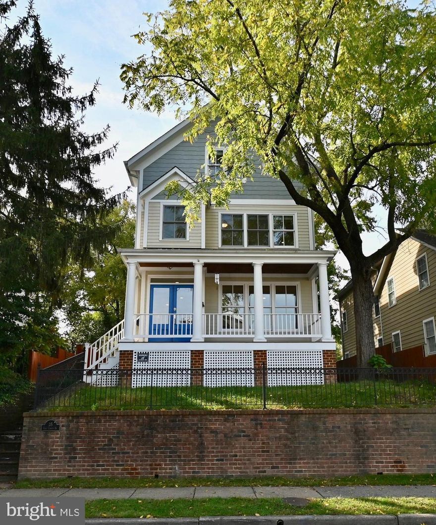 Take advantage of this rare opportunity to live, work and park in Alexandria in an exceptional custom craftsman home with 7 bedrooms, private parking for 4 cars with additional street parking.  You'll be impressed by the custom woodwork, high-quality hardwood flooring, recessed lighting, a convenient upper-level laundry area, and whole-house wiring for computer and entertainment technology. The spacious rooms in the main home with 4 levels and the outdoor private space with a stone patio and custom stone bar can accommodate all your family/friend needs. The studio over the 2-car garage has a full bathroom and is ideal for guests or a separate workspace. The finished basement has a projection theater system and a private entrance that can also be used as a workspace if needed.
Enjoy the huge loft bedroom/flex space with a balcony that provides sweeping views towards the Masonic Temple and Alexandria. Be prepared to gather with friends on the front porch and enjoy neighborly conversations with the passers-by in this highly sought-after and very walkable community of Rosemont / Del Ray. The home is close to everything! The King Street Metro, Amtrak, National Airport, shops, restaurants,  all that Old Town and Del Ray have to offer.  Amazon HQ2, the Pentagon, and all of Washington DC are an easy commute.