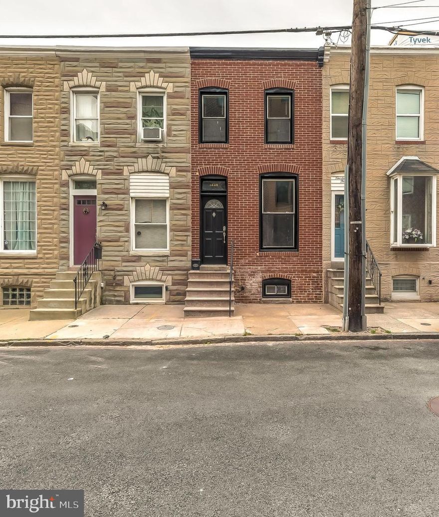 Like new renovation in Locust Point.  Brand new re-pointed exterior brick with new railings.   All new upper level with new carpet and full bath complete with double vanity.    Spacious floor plan with half bath and laundry on main level.  The basement is 1/2 finished perfect for an office or additional bedroom.    A+ location!