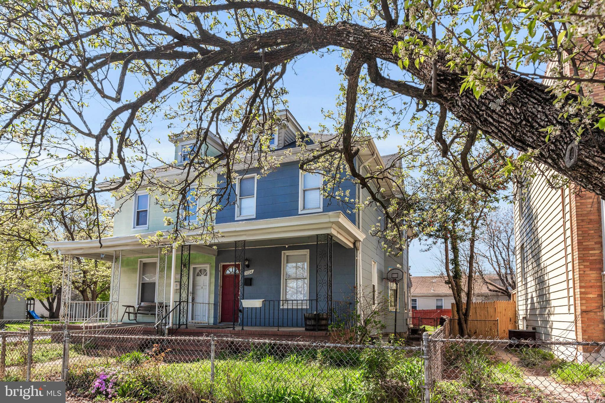 What a deal! This charming end-of-group row home offers so much space for you and your family! Featuring four generously sized bedrooms, well appointed with natural wood on every surface. The main level includes several large windows which bring in a ton natural light and recently updated kitchen. Don't miss the fully fenced in backyard that includes an oversized shed! This property is quintessential "charm city!"