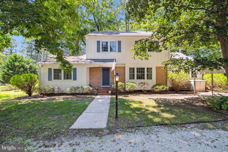 **Cat will likely hide but please do not let it outside**WOW! Situated on almost an acre of level, waterfront property this one has it all!  Walk out your door and launch a kayak in your backyard and roam for miles exploring the wilderness of the beautiful Wicomico River.  Enjoy the ease of a first floor owners suite with hardwood floors and a walk in closet.  In addition to the primary suite, upstairs are 3 large bedrooms and a Jack and Jill bathroom-beautiful hardwood floors throughout.  Large living room with fireplace(as is), hardwood floors leading you to the formal dining room and a lovely family room addition with gas fireplace looking out to the water.  Screened porch and open deck to enjoy the lovely sounds of nature.  Garage was converted to additional living space and had a full bath that is now being used as a laundry area but still has a partial bathroom.  This area could easily be converted to a completely separate living area as it has its own entrance as well. I have counted this as the fifth bedroom but great for an office/den too!!  Excuse the mess in there as it is the staging area for the move!