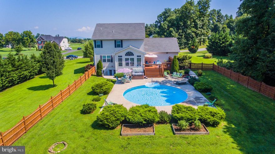 Great 1.4 acre lot backing to farm land, backyard oasis with inground pool and fencing, finished basement w/5th BR, rec. room and ad'l kitchen space, morning rm with vaulted ceiling and palladium window, kitchen w/granite, 42" cabinets, hdwd, front porch, rear deck, 2 car garage, Spring Mills Schools. SPLISH SPLASH THE POOL IS OPEN!