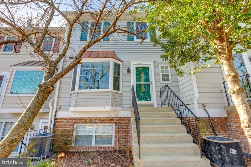 Beautifully renovated 2 bedroom, 1.5 bath unit  A Chef s delight Kitchen with 42 in Cherry Cabinets, Granite counter tops with loads of Storage and room for table in kitchen. Engineered laminate flooring on main level, half bath, fresh paint, new refaced fireplace, new recessed lighting, and extra outlets, brand new deck.Upper level with 2 large bedrooms, new ceiling fan, loads of closet space, linen closet, large full bath, and pull down attic with new fan.Front load washer and dryer with cabinetry which leads out to fenced patio and common area.
