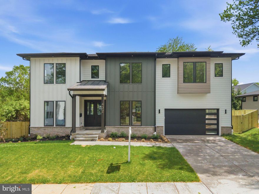 Introducing Verity Builders’ newest masterpiece on Marshall Road in Vienna, a beautifully upgraded custom home set on a rare quarter-acre lot that features a coveted main-level bedroom suite. With 6 bedrooms, 6 full baths, and 2 half baths, this exceptional residence blends modern luxury with everyday comfort and thoughtfully designed spaces throughout.

Step inside to soaring 10-foot ceilings on the main level and a seamless open-concept layout that effortlessly connects the kitchen, dining area, and great room, perfect for both relaxed living and memorable entertaining. The gourmet kitchen is a true centerpiece, highlighted by an expansive island, quartz countertops, custom Birch cabinetry, and a premium GE Monogram appliance package complete with a double wall oven and range top, delivering both high performance and timeless style.

Extensive upgrades elevate the home at every turn, including detailed wainscoting, site-finished oak flooring on the main level, solid core doors, and custom closet built-ins that reflect superior craftsmanship. A private main-level en-suite bedroom, rarely found in combination with a 0.25-acre lot in Vienna, offers outstanding flexibility for guests, multigenerational living, or a private retreat. A dedicated home office supports today’s work-from-home needs, while the mudroom and attached garage with EV charging port add everyday convenience.

Upstairs, the luxurious owner’s suite provides a peaceful sanctuary, complemented by well-appointed secondary bedrooms, including a junior suite and additional bedrooms connected by a their own private baths, offering the ideal balance of privacy and functionality. Plush carpeting enhances the comfort of the bedrooms, while oak flooring in the hallway adds a refined touch.

The fully finished lower level is designed for both entertainment and relaxation, featuring a spacious recreation room, a media room, and an additional bedroom with an egress window that fills the space with natural light.

Outdoors, a large composite deck overlooks the expansive quarter-acre lot, creating an exceptional setting for outdoor dining, play, and gatherings, all nestled in the heart of Vienna.