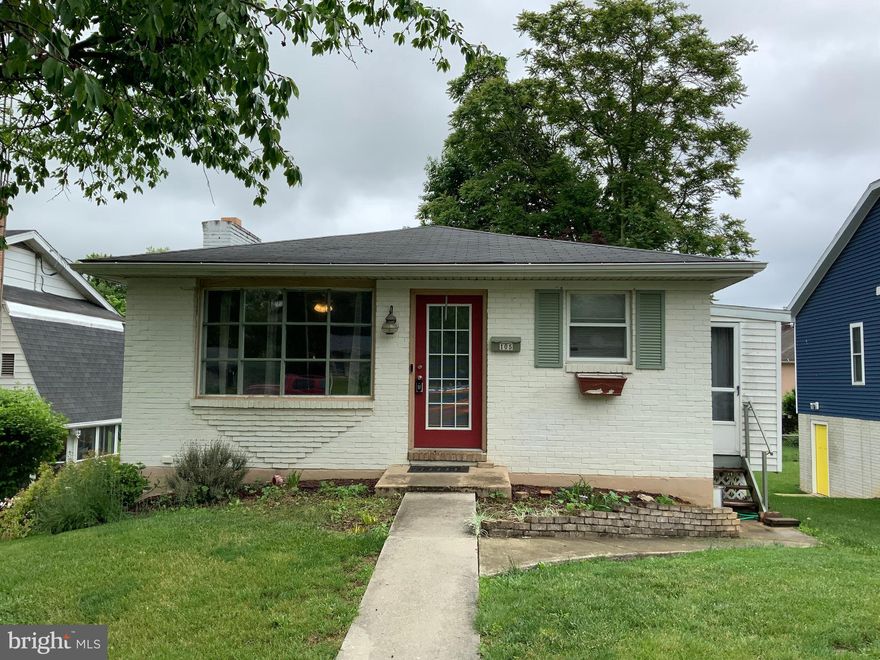 Two houses for one price! (Live in one, rent the other) Main house is a Brick Rancher with 4 BR, 2 BA updated w/laminate and ceramic flooring, a one year old heat pump/central air for comfort year-round, some renovations including new Roof shingles 7 years ago, a finished basement with wood burning fireplace, and an enclosed 3 season side porch (no heat or air in this space). There are ongoing repairs scheduled for 6/10.  House will be professionally cleaned 3rd week of June.  Situated on the West End just two blocks from the park.  Mature trees for relaxing in the shade on the patio.  Electrical hookup available in rear yard for future pool, etc.  The separate 2 BR cottage one BA is great for extended family or rent to offset your mortgage payment, one main level bedroom and one on upper level, fenced yard and front porch. (Long term tenant in place and would love to stay.  Currently on month to month lease).  Separate off street parking from alley. Property cannot be subdivided.  This will not last!