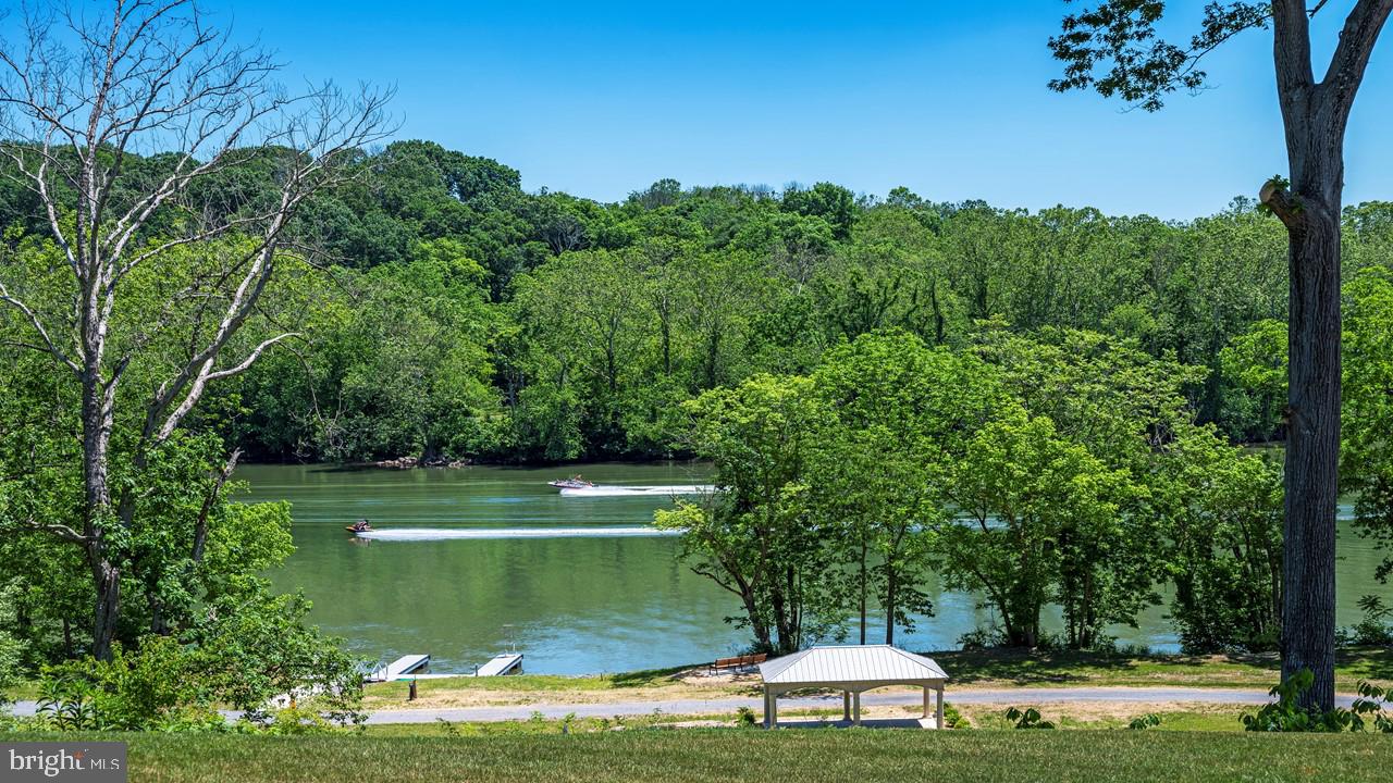 Build your dream home on this gorgeous 3-acre lot located in an upscale, gated waterfront community just minutes from historic Shepherdstown, WV. Surrounded by luxury homes, this property offers exclusive river access and an exceptional lifestyle. Deeded private boat dock included with sale. Property Highlights include: community boat ramp access, 12 miles of deep water on the Potomac River, Nature trails throughout the community, high-speed fiber optic internet available, close to private and public golf courses, shopping and dining, Easy access to I-81, MARC train, and only 50 miles to Washington, D.C. Enjoy the perfect blend of natural beauty, privacy, and convenience. Whether it's boating, trail walking, or simply soaking in the views, this lot offers a rare opportunity to live in one of the area’s most desirable communities.