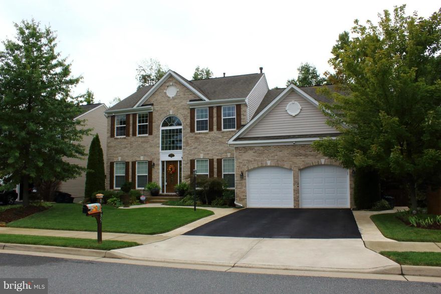 Beautifully maintained 5 bedroom/3.5 bath home with more than 4000 finished sqft.Backs to Woods.Large MBR with custom made walk in closet&Cathedral Ceiling.Luxurious MBA w/Dual Vanities.Kitchen features center Island/breakfast bar, granite counter tops,42"cabinets and wood floors.Fully finished basement with spacious 5th Bedroom, full bath,&RecRoom.Subject to 3rd party approval.