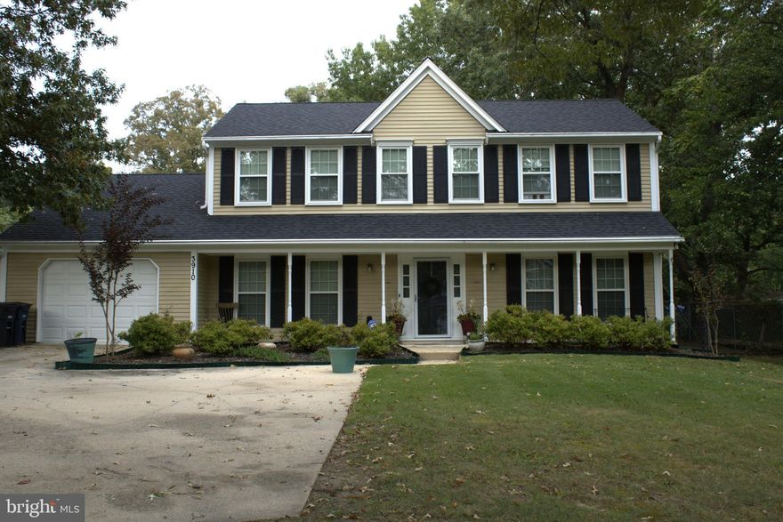 Nestled in the charming Oaklawn subdivision, this delightful Colonial-style home offers a perfect blend of comfort and functionality. With 1,824 square feet of thoughtfully designed living space, this residence is ideal for those seeking a warm and inviting atmosphere. Step inside to discover a traditional floor plan that seamlessly connects the living areas. The gourmet kitchen is a true highlight, featuring stainless steel appliances, including an ENERGY STAR refrigerator/with water filtration system, built in bottle chiller and dishwasher, ensuring both style and efficiency. Enjoy casual meals in the eat-in kitchen or gather in the dining area for more formal occasions. The pantry provides ample storage for all your culinary needs, while the family room off the kitchen creates a cozy space for relaxation and connection. The home boasts four spacious bedrooms, providing plenty of room for everyone. The master suite is a serene retreat, complete with an en-suite bathroom for added privacy. With two full bathrooms and an additional half bath, morning routines will be a breeze. Rich hardwood floors and plush carpeting enhance the warmth of the interior, complemented by elegant crown moldings and ceiling fans that add a touch of sophistication. The attic offers additional storage space, ensuring that your home remains organized and clutter-free. Outside, the property features a generous 0.46-acre lot, perfect for outdoor activities or gardening. Enjoy evenings on the deck or patio, where you can unwind and soak in the tranquility of your surroundings. The exterior is equipped with thoughtful lighting and flood lights, enhancing both safety and ambiance. Parking is a breeze with an attached garage and a concrete driveway, providing convenience for you and your guests. Security features, including exterior cameras and smoke detectors, offer peace of mind. Located just under a mile from public transportation, this home combines suburban charm with accessibility. With its excellent condition and inviting features, this property is ready to welcome you home. Experience the perfect blend of comfort, style, and convenience in this Oaklawn gem. The following improvements have been updated or new: New roof 2025, A/C unit, Electrical box, water heater.  Ready to Move In!