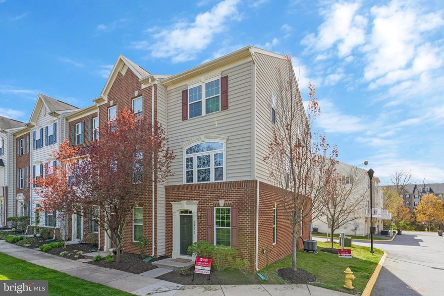 You will not want to miss this gorgeous, end unit townhome in Heathcote Commons. This home features two bedrooms and  2.5 bathrooms. Gourmet kitchen with center island, granite counters, stainless appliances and hardwood flooring. Family room prewired for speakers and concealed TV wiring. Walkout from main level on to deck perfect for entertaining. Master bedroom has dual closets, ensuite bath with Roman shower and double granite vanity. 2021 HVAC system replacement. New washer / dryer. Lower level features new LVP flooring, rough in for half bath and one car garage. Excellent location - close to major commuter routes and shopping. Walk to Harris Teeter. Community includes tot lots and pool. All lawn maintenance, trash service, and snow removal included in HOA. Come fall in love!!!