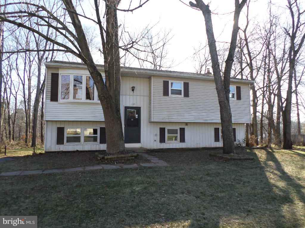 Bi-level home on private wooded lot between York & Harrisburg 3 BRs and full bath on main level...finished walk-out family room with 4th bedroom,laundry and full bath Equal Opportunity Housing