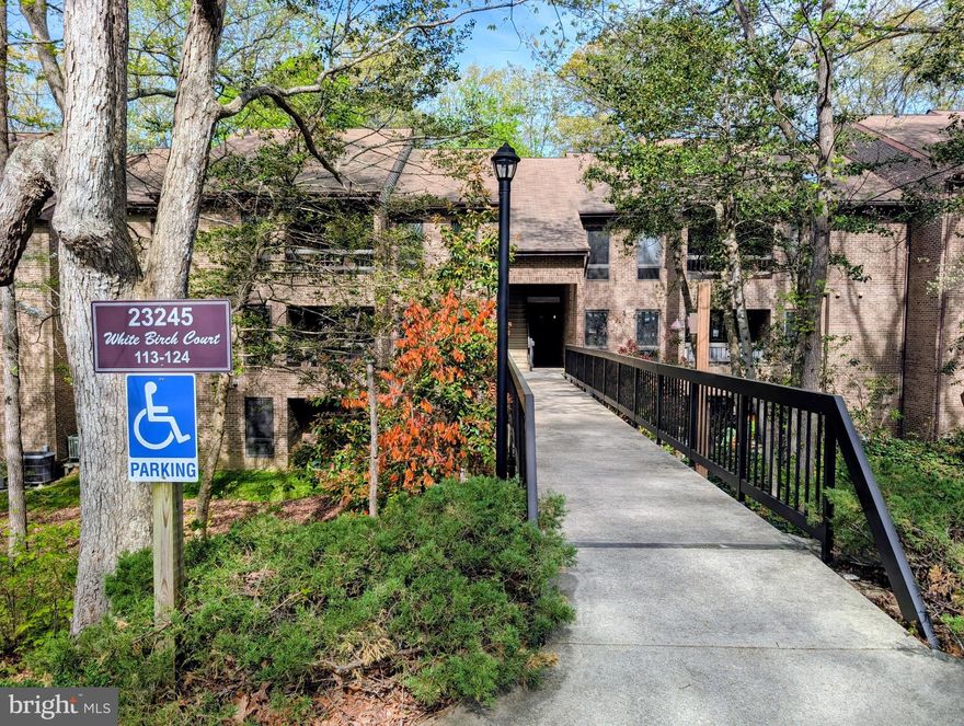 Ground level condo with 2 bedrooms and 1.5 baths. Primary bedroom has large walk in closet and half bath. 
 Located near PAX/NAS, restaurants, and shopping. Step out to your private patio looking at the trees and nature. This unit features a spacious living/dining room combo, Newly remolded Galley style kitchen, and in-unit washer & dryer for your convenience. HVAC system and water heater were replace in 2020.
Unit # is 115