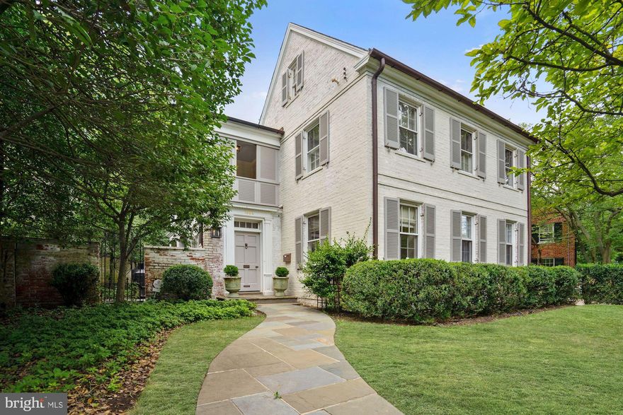 THIS EXTRAORDINARILY CHARMING NEW LISTING HAS BEEN MUCH ADMIRED OVER THE YEARS & RECENTLY UNDERWENT A TRANSFORMATION BY BARNES & ZANTZINGER MASTER CRAFTSMEN TO FULLY REALIZE ITS FULL POTENTIAL.  COVERED PORCHES ON 2 LEVELS, AN OUTSTANDING KITCHEN ADDITION & 2-CAR GARAGE ARE JUST A FEW OF THE SPECIAL IMPROVEMENTS THAT MAKE THIS SINGULAR HOME A TRUE STANDOUT AMONG THE REST. THE WHITE WASHED BRICK & LOUVERED DOORS & PORCHES HARKEN TO A CHARLESTON SENSIBILITY & WILL SURELY PLEASE THE MOST DISCERNING PALATE.