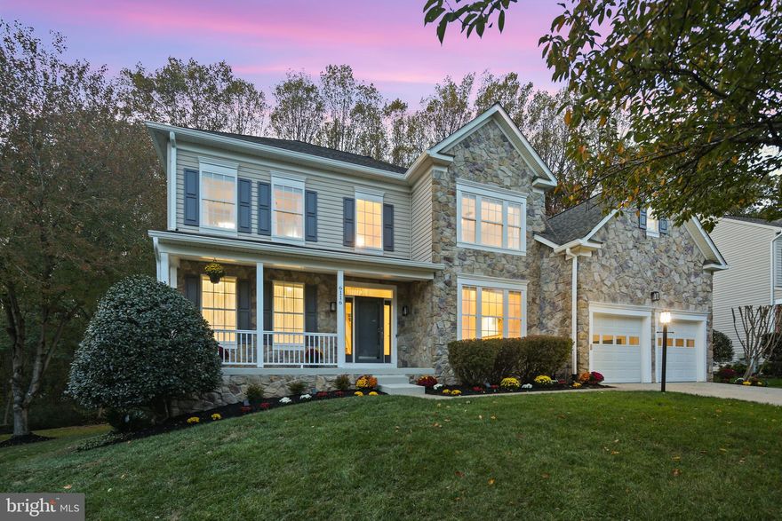 Magnificent Luxury Home in the Heart of River Hill!
Nestled on a peaceful cul-de-sac, this extraordinary residence perfectly balances refined elegance, thoughtful updates, and a rare natural setting. Situated on a picturesque 0.4-acre lot backing to forest conservation, home enjoys a high elevation with breathtaking views of mature trees, lush green lawns, and vibrant flowering gardens.
A charming stone-accented façade, wide front porch, and new high end entry doors set a grand first impression, welcoming you into 5,000 sqft of beautiful living space.
Step inside to a dramatic two-story foyer, flanked by formal living and dining rooms with exquisite light fixtures- setting the tone for the home’s sophisticated interiors.
The private rear office features double French doors, large windows, and amazing views of the surrounding landscape—ideal for work-from-home.
A stunning, brand-new chef’s kitchen showcases soft-close white shaker cabinetry, an expansive waterfall island with added cabinets and built-in microwave, designer pendants, premium quartz countertops, and a striking glass tile backsplash. A vented hood over gas range elevates the culinary experience, while the bar area flows effortlessly into a sun-drenched morning room—perfect for daily enjoyment and entertaining family and friends.
Just beyond, the soaring two-story family room is bathed in natural light through new skylights and walls of windows, offering panoramic views of the backyard. Rich hardwood floors span the main level, and a new composite deck extends the living space outdoors, creating a seamless indoor-outdoor retreat.
Upstairs, you’ll find 4 spacious bedrooms and 3 fully renovated bathrooms. The luxury primary suite boasts tray ceilings, a massive walk-in closet, and a sitting area with window walls for serene woodland views. The spa-inspired ensuite is beautifully appointed with a jetted soaking tub, frameless glass shower, and a dual-sink vanity. Two additional hall and guest bathrooms have been updated with walk-in showers and modern finishes.
The fully finished walkout basement adds exceptional versatility, offering a 5th bedroom, a flex room, updated full bath, home gym, expansive recreation space, and oversized storage. New high quality lux LVP flooring  throughout.  
Outdoor living is equally impressive with extensive hardscape, including a retaining wall, oversized paver patios, flower beds—all designed to create a stunning, low-maintenance outdoor oasis. The property line is set deep in the woods.
Updates also include:
fresh interior and exterior paint,
new hardware and designer lighting throughout,
whole-house CAT6 cabling and professional networking setup,
custom closet systems with organizers on all three levels,
roof, Carrier HVAC, water softener, and water heater all recently replaced.
This turn-key luxury home is better than new.  Prime location—just moments from scenic trails, top-rated River Hill schools, fitness centers, pools, shopping, dining, and major commuter routes (32/29/95) for easy access to Baltimore, Washington, D.C., Rockville, and Annapolis. 
Welcome home to the best of River Hill living—where timeless elegance meets modern comfort.