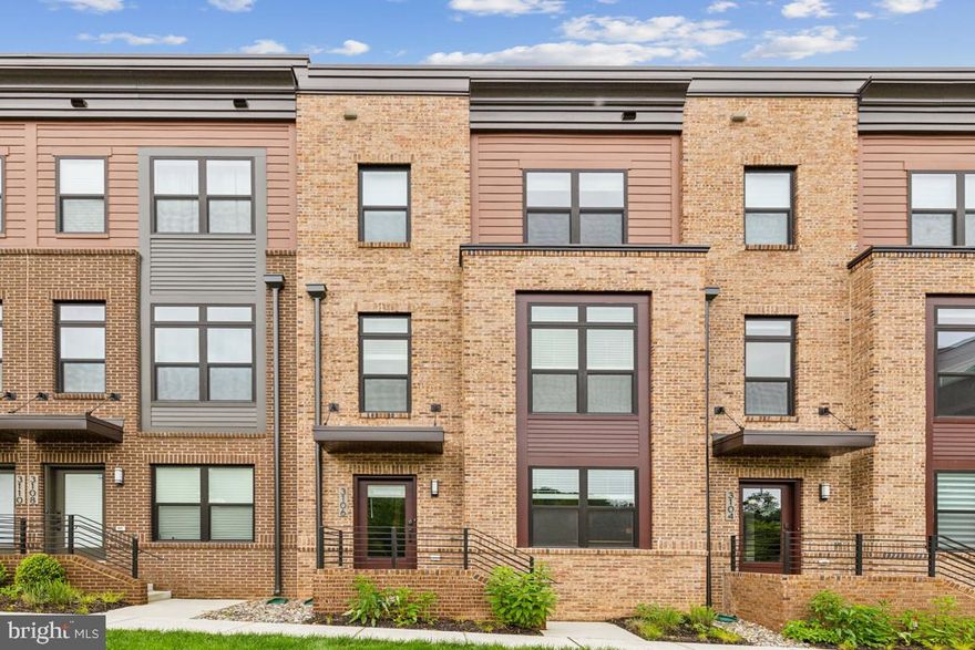 This 3 bedroom plus den, four-level townhouse at Tower Oaks built by EYA is nearly new-- just built in 2022 with modern finishes, smart upgrades with hardwood flooring throughout the home. 

The main level features an open layout with a living area, half bath, dining space, and kitchen with quartz countertops, upgraded appliances, pantry, and a large center island with additional storage. Also enjoy a main level deck.

The third level has a primary suite with two walk-in closets and a bath with an upgraded shower and dual vanity. A second bedroom has a private en-suite bath and can be used as a second primary bedroom. You'll also enjoy the convenience of laundry and storage on this floor.

The top level includes a third bedroom and full bath, a loft-style living area, and access to a rooftop deck with upgraded tile flooring.

The entry-level includes a den or office that has the potential to be converted to a bedroom, plus access to the two-car garage.

The Reserve at Tower Oaks includes access to a clubhouse with fitness center, yoga studio, pool, playground, sport court, and more. It is conveniently located near Clyde’s, Park Potomac, Pike & Rose, I-270 and Rockville Pike.