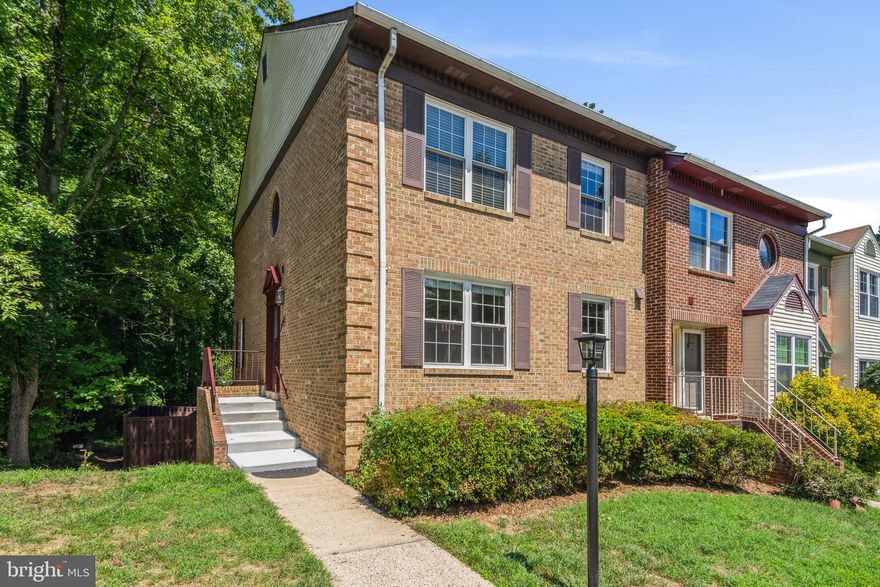 Welcome to this beautiful updated end unit townhome backing to parkland!  This is one of the largest models in the Runnymeade neighborhood siding to common ground with views of trees and parkland from many windows and from the multi-level deck.  Enter into the two story foyer and you are greeted by the spacious, open main level floorplan with hardwood flooring.  The kitchen is updated with custom 42" cabinets, stainless steel appliances including double oven, granite counters and a breakfast bar island (2017).  The sun drenched kitchen continues into the breakfast room with space for a large table.  Walk past the formal dining room & step down into the living room which features a wood burning fireplace, additional end-unit only window and a sliding glass door that walks out to a deck overlooking treed parkland and a fenced backyard with a spacious multi-level deck for entertaining.  The upper level boasts three bedrooms including an oversize master bedroom with dressing area, large walk-in closet and full bathroom.  Two additional bedrooms and another full bath complete the upper level.  All three bedrooms and hallway have hardwood flooring.  The spacious lower level recreation room walks out to the fenced yard and deck.  A den and full bathroom are also  found on the lower level.  There is a laundry room area with washer and dryer as well as a sink and cabinetry for added storage.  The windows have all been replaced with vinyl double pane insulated windows in 2018.  The location of the home is truly superior - 1.7 miles to Van Dorn Metro Stop, easy access to 495/95/395/Ffx Cnty Pkwy/Ft. Belvoir/Downtown, .5 miles to bus stop on Van Dorn - close to Franconia Rec Center and Kingstowne Towne Center.  New architectural shingle roof to be installed next week.  Welcome Home.