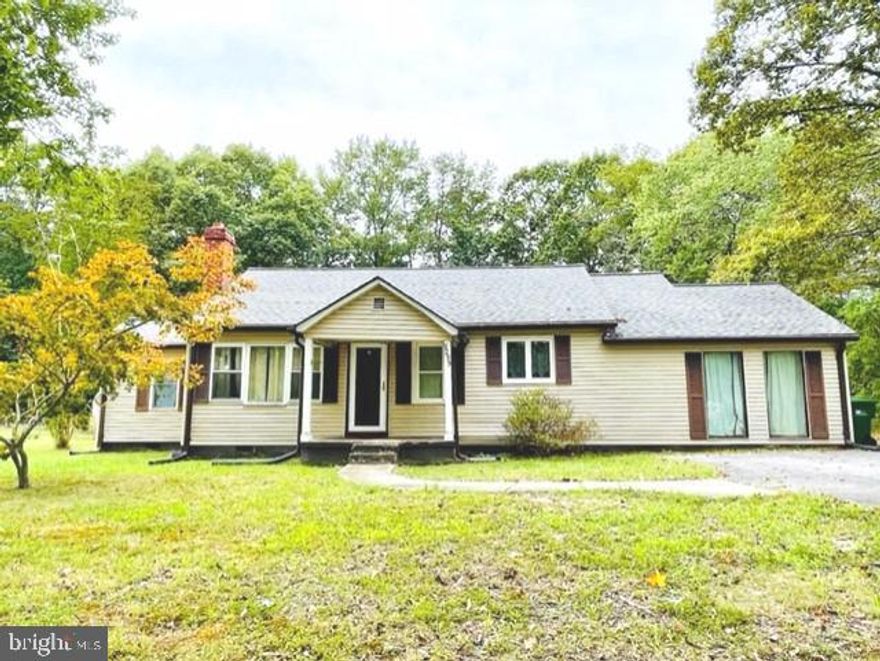 Welcome home to your 3 bedroom, 1 full bath rambler with almost 2,000 sq. ft. of living space, plus half an acre of privacy with trees surrounding you and NO HOA.  Extended driveway, patio, and level yard to entertain; plenty of driveway space for your vehicles.  Large shed for outside tools and toys.  Enjoy your eat-in kitchen open to large family room with vaulted ceiling and french doors leading to your patio.  Separate living room with hardwood floors and a brick fireplace/wood stove. There's a separate dining room, as well, with white columns.  Newer roof, newer HVAC, newer dishwasher, refrigerator and washing machine, as well as a new shed.  Property being sold AS-IS and is priced accordingly.  There is a 1 year home warranty in place that transfers to the buyers upon settlement.  Sellers prefer to settle with Buyer's Title, Inc. in La Plata, MD.  Seller may need time to find another home.