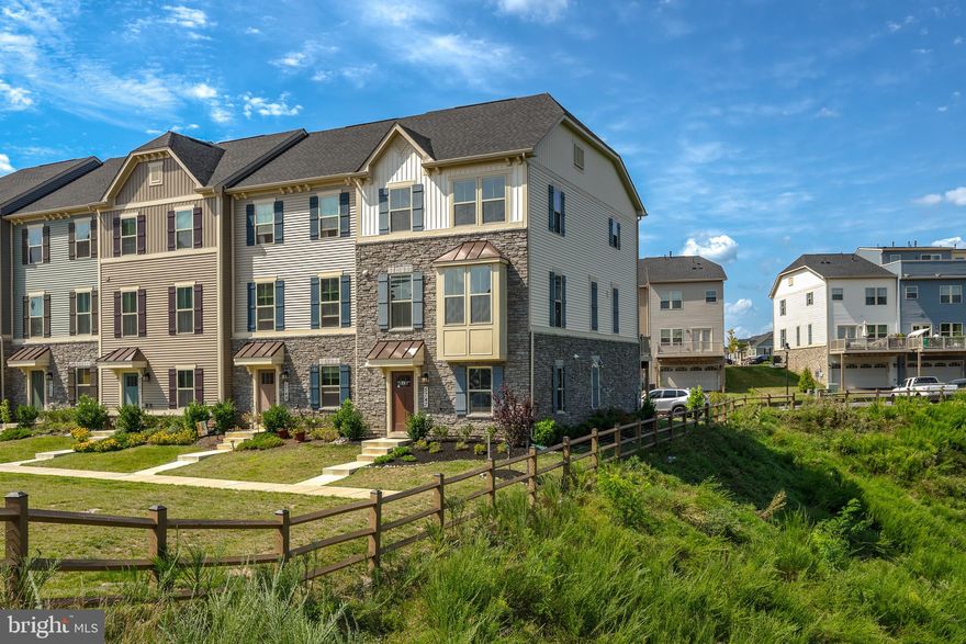 STUH-NNING! This 3-year-young Corner Townhome built by reputable Ryan Homes is located in the highly desirable Oakdale Community within Lake Linganore at Eaglehead. The first-level entrance welcomes you to a comfortable family room, flex room, closet space, a bathroom rough in, and leads the way to the rear-entry spacious 2-car garage with driveway. The garage floor has been finished with a high quality epoxy coating system with charcoal granite look - 1/4'. Up a flight of stairs you will encounter an ample living room, a half bath, kitchen, dining area and access to the deck which provides lovely views to an adjacent conservation area. The modern gourmet kitchen includes an island, gorgeous quartz countertops, white cabinets, and stainless steel appliances. The third level is defined by elegance and functionality - 3 bedrooms, 2 bathrooms and a laundry with upgraded commercial washer and dryer! All rooms contain generously sized closets. The Owner's Bedroom - a private retreat with tray ceiling and enormous walk-in closet. The Owner’s Bath boasts a soaking tub and separate shower. Lake Linganore members enjoy access to four private lakes, two beaches, three pools, eight tennis courts and miles of scenic trails! There are also basketball courts, Tot Lot’s and common areas available. Why are you still reading this? This is THE ONE!