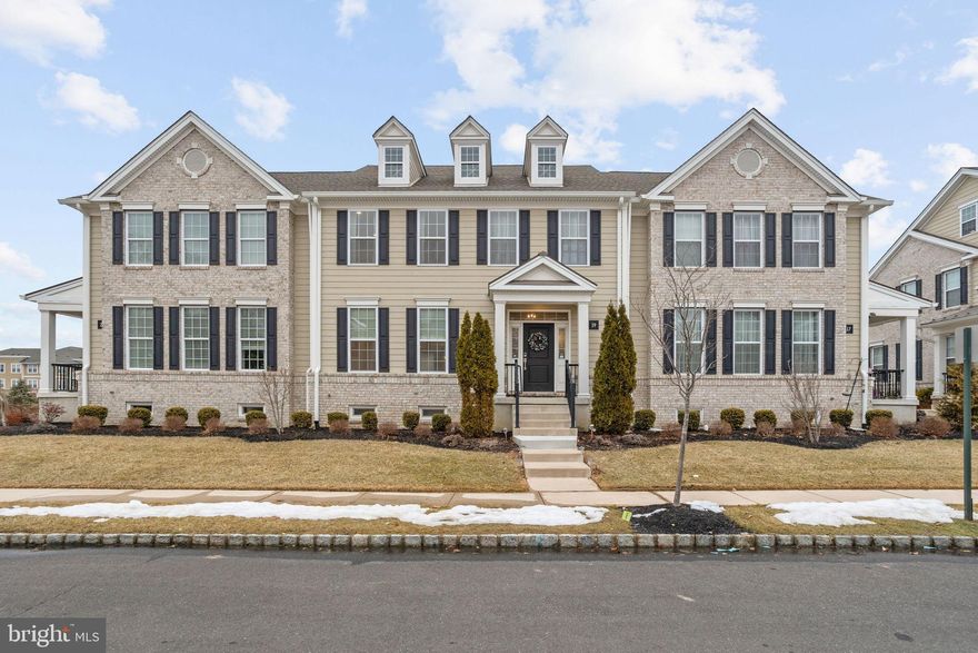 A rare opportunity to own a residence where modern luxury, architectural elegance, and an unparalleled West Windsor lifestyle come together in perfect harmony. Built in 2019 by Tollbrothers and impeccably maintained, this stunning home sits just moments from the Princeton Junction Train Station and minutes from the cultural heartbeat of downtown Princeton—placing fine dining, shopping, and entertainment effortlessly within reach. From the moment you step inside, you’re greeted by an expansive open concept design framed by soaring 9-foot ceilings, sunny living spaces, and rich hardwood flooring that flows seamlessly across both levels, creating an atmosphere of refined sophistication. At the center of the home, the gourmet chef’s kitchen stands as a true statement of luxury, featuring premium appliances, custom cabinetry, and an oversized island that invites both intimate gatherings and grand entertaining. The adjoining family room, breakfast area, and thoughtfully designed mudroom elevate everyday living with comfort and style. Upstairs, the lavish primary suite offers a serene retreat with a spa-inspired bath and a walk-in closet with a custom closet system that creates a refined space, while two additional bedrooms, a beautifully appointed hall bath, and a spacious laundry room with sink and racks provide exceptional convenience. A dramatic loft with skylight and walk-in closet expands the home’s versatility—ideal for a private office, media lounge, or guest suite—bringing the total living space to 3,235 square feet. The fully finished basement (2021) adds more than 1,420 square feet of additional luxury, with soaring ceilings and endless potential for a fitness studio, home theater, recreation room, or all of the above. Completing this exceptional property are a two-car garage with EV charger and abundant storage. This is a place to experience elevated living in one of West Windsor’s most coveted commuter locations, where elegance, convenience, and everyday luxury define the way you live.