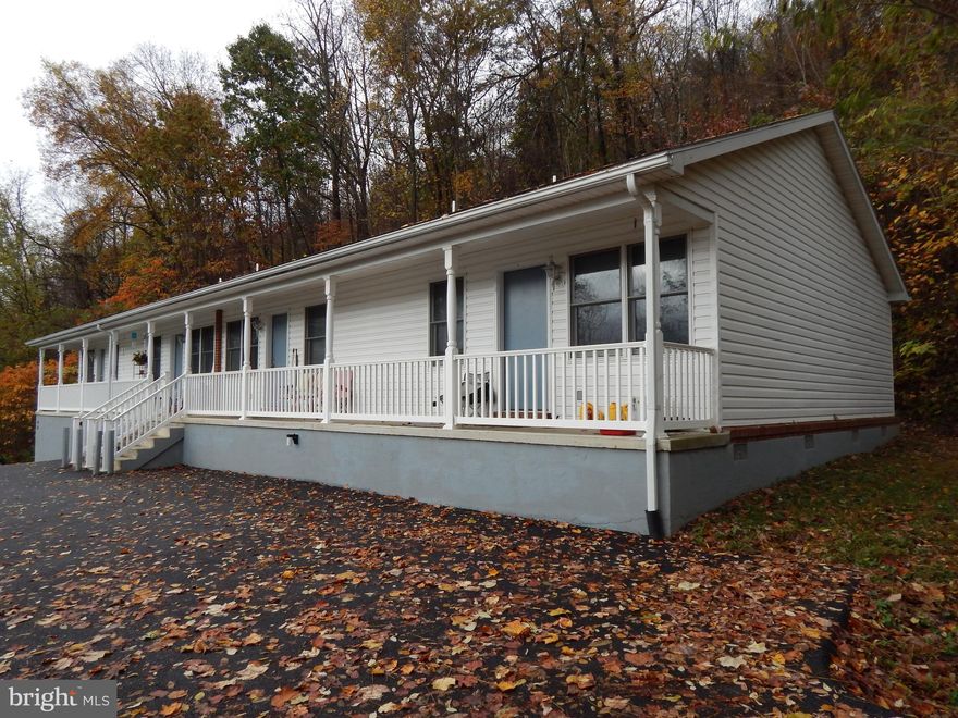 Situated on .323 acre just minutes from Berkeley Springs. 2 connecting duplexes for a total of 4 rental units. Built in 2005, each unit contains 600 sq. ft. with 1BR, 1BA, Living Room, and Kitchen. Duplexes share a coin operated washer and dryer. Central Air and Vac with City water and sewer.