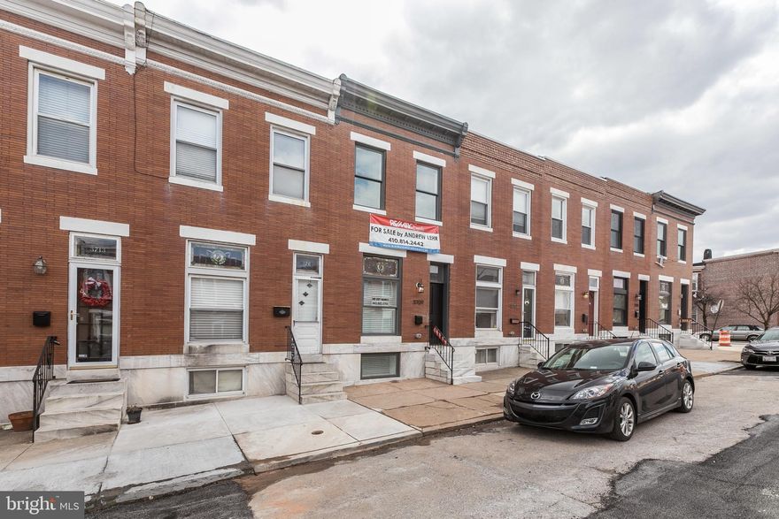 EXPANSIVE CHAP TAX CREDIT RENOVATION W/ LARGE REAR ADDITION & PARKING PAD - this 14' wide renovation with over 2000 sq ft of living space features hardwood floors throughout, exposed brick, coffered ceiling, crown molding, large island kitchen w/ ss appliances, granite counters & tile backsplash leading to bonus room. Upper level offers 2 big bedrooms, oversized owner suite with double bowl vanity, luxurious shower, huge walk-in closet & hallway access to roof deck. Finished 8' lower level w/ 2 bedrooms,  walk out stairs and bonus storage room - 7 years remaining on CHAP credit, current taxes only $3893/year!