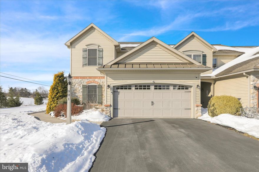 Beautiful end-unit townhome on a premium corner lot with views, located in the desirable Community of AN OFFER HAS BEEN RECEIVED. ALL OFFERS MUST BE SUBMITTED BY 6;00 PM SUNDAY, FEBRUARY 22, 2026. Briar Lake. This luxury-appointed home offers over 2,200 square feet of thoughtful designed living space with an open, airy floor plan and tasteful finishes throughout. The main living area features a stunning two-story great room with a cathedral ceiling and gas fireplace. The newly updated kitchen has a beautiful new backsplash, new granite counter tops and new stainless-steel appliances, including an induction range. The primary suite is conveniently located on the main level and includes a double vanity, walk-in shower, and a spacious walk-in closet. Upstairs, a generous loft area overlooks the great room, creating a bright and versatile living space along with two bedrooms and a full bath-ideal for guests or hobbies. A private screened porch is perfect for enjoying the outdoors day or night. A full unfinished basement provides ample storage or future expansion potential. With its well-designed floor plan including flexible space, this home is a perfect to enjoy the next chapter in life.