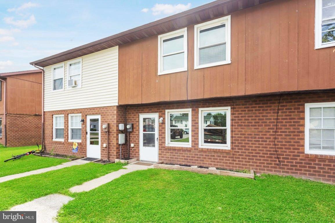 You don't want to miss this nicely updated townhome. Brand new LTV flooring throughout the entire 1st floor. Nice sized living room with neutral paint color and tons of natural light. The adorable eat-in kitchen includes all of the stainless steel appliances and the 1st floor laundry closet and half bath are super convenient. Upstairs there are 3 bedrooms, 1 with a walk in closet, and they all have brand new carpeting. The full bath has a linen closet to keep things neat and tidy. Out back there is a big deck and tons of room to run around in the level back yard, plus the big shed conveys. This home also features off street parking for 2-3 cars.