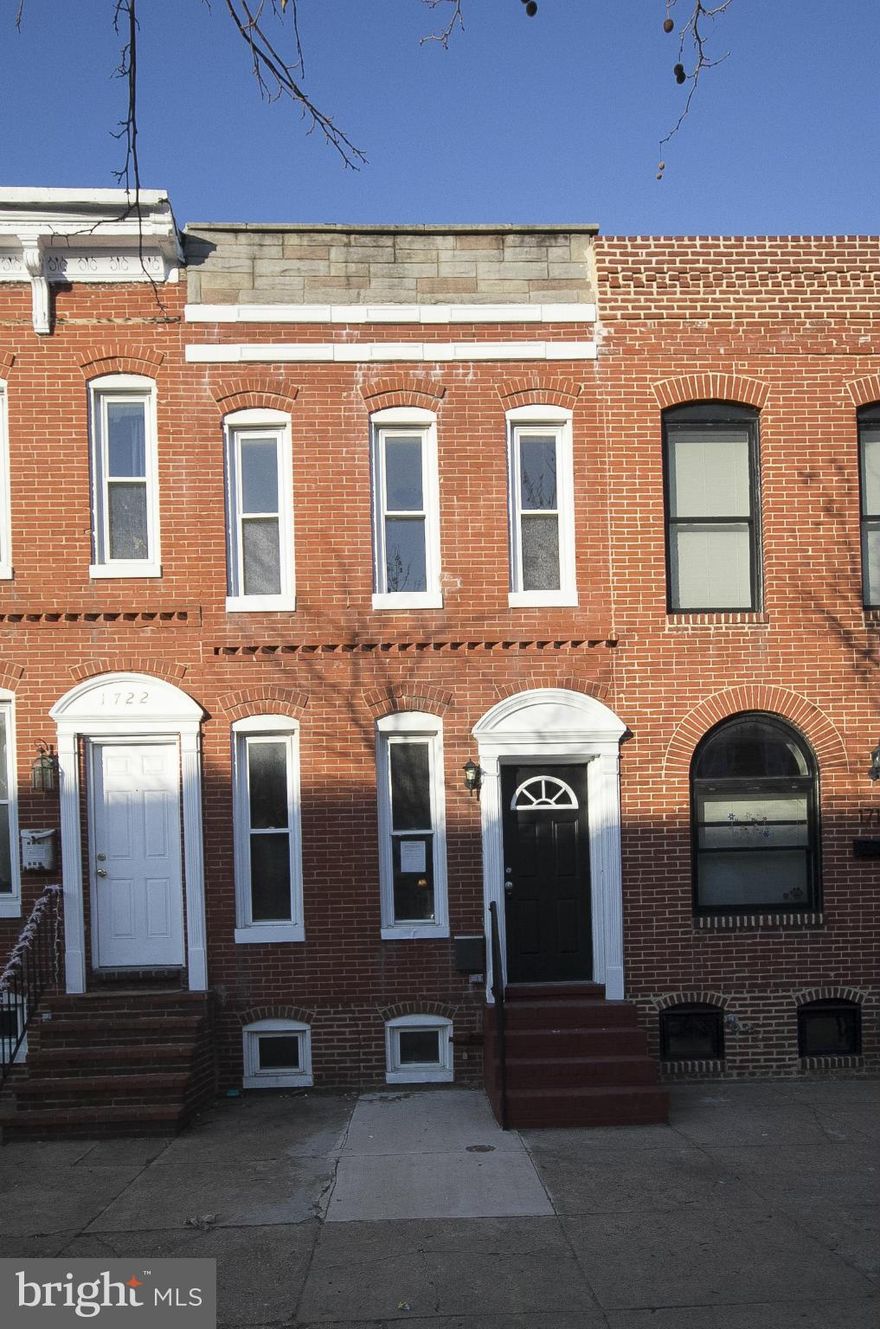 Move right into to this nicely updated home just blocks from all of the Federal Hill Attractions.  Enjoy wood floors, new kitchen & appliances, freshly painted & new carpet.  A great starter home for the price.  An OFF STREET PARKING PAD is an added bonus!  Walk to both sports stadium, Cross Street Market, & the future Port Covington!