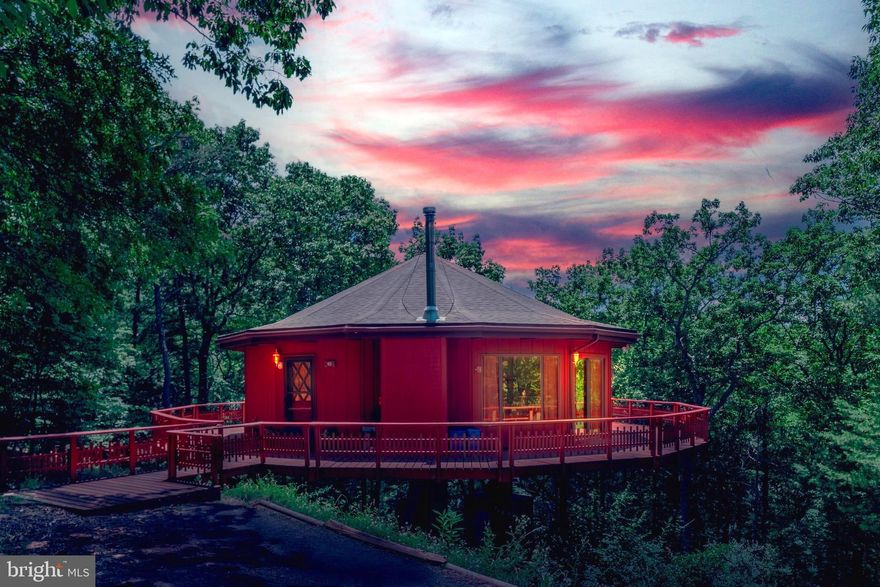 Cute as a button! This round Chalet on double lot is ready for its new owners. 2 bedrooms, loft, beautiful all the way around deck with tons of windows and no close neighbors. Provides the best mountain views. Open floor plan with central heat/air. Woodstove insert. So close to all the amenities and main resort. Makes this home the perfect option for Any situation. Fulltime living, Seasonal home, rental investment, Airbnb, or weekend getaway with very little maintenance. Priced to sell! Add this home to your list and make plans to see it today.