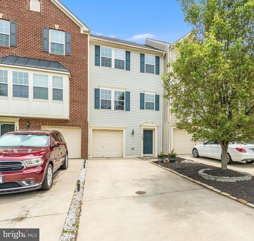 Presenting 118 Short Branch Rd- the perfect blend of amenities and convenience! This 3 level townhome boasts 2,224 sq ft of well designed living space including 3 bedrooms and 2.5 bathrooms. The main living area features a spacious kitchen with granite countertops and stainless steel appliances that perfectly complement custom oak cabinetry and hardwood floors. The bright sunroom area is perfect for a casual dining space. You’ll love being able to invite friends to visit! The carpeted rec room in the basement has a gas fireplace and a slider door leading out to the brick paver patio. Follow the stairs up to the expansive composite deck where all the BBQ action takes place. You can easily visualize yourself relaxing here on the weekends! The third floor of your new home offers 3 carpeted bedrooms. The primary bedroom boasts a walk-in closet for your wardrobe while the en suite bathroom has a lovely tiled tub surround. The second and third bedrooms have lovely natural lighting and share a traditional hall bathroom. You’ll find the utilities are also upgraded: The water heater is just 2 years old and has an efficiency pump to the third floor, a water treatment system is available, and for health and comfort there is a furnace humidifier and an electrostatic air filter. The Woodstream neighborhood is a quiet, friendly place with pools, basketball courts, playgrounds, and a walking trail to nearby Smith Lake Park. It is located right in the heart of Stafford’s main shopping and dining area and it is mere minutes to commuter lots, I95, Rt 1 and Quantico.