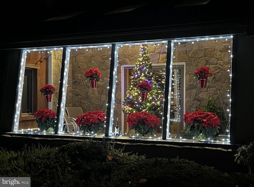 Welcome to this lovely mid-century modern home just over the Delaware line!  Sustainable living meets modern comfort! This custom built, energy efficient passive solar home is not your average house.  This thoughtfully designed 4-bedroom, 2.5-bath home is nestled on a serene and private one-acre lot in an idyllic neighborhood of unique homes (NOT cookie-cutter homes!)  Just15 minutes from the University of Delaware, this home offers energy efficiency, natural light, and year-round comfort with minimal environmental impact.  Once inside you'll notice the lovely tile floors in the dining room and adjoining kitchen that are part of the solar concept. The kitchen has custom oak cabinets and Corian counters with a section of butcher block.  Off of the kitchen is the laundry room and a pantry with insulated drawers for wine. The great room has a ceiling to floor wall of custom local stone that encases the wood stove. This, coupled with the high ceiling design is easily the focal point of the home.  Off of the great room is a main floor office, perfect for those working remotely! The parquet wood floor is from the Goldey Beacom College basketball court!  There's also a bedroom on this level with a cedar closet and half bath.  Rounding out the main level is a lovely custom stone and cedar 4-season sunroom, complete with 3 skylights.  As you travel up the oak cantilevered stairs you'll find 3 more bedrooms.  The primary suite has oak flooring, walk in closet and private deck overlooking the back yard.  The en-suite bath has a shower with glass block floor to ceiling surround, double back lit night lite sinks and plenty of storage.  The other bedrooms share a Jack & Jill bath with back lit sinks and Jacuzzi tub with glass block wall surround. The bedrooms have clerestory windows to hold heat. Out back you'll find a large deck for relaxing as you look out over the lovely and private back yard.  Add to this a 3-car garage and a large driveway that has a partial stone wall surround. This lovely home in the award-winning Avon Grove School District is ready for it's new owners!  Could it be you?  Sellers are offering a $1000 credit towards new kitchen appliances as well as another $1000 towards replacing the red carpet.