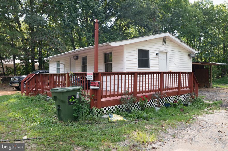 ***Price Improvement*** This charming ranch-style home, beautifully renovated in 2021, offers a cozy retreat with modern comforts. The inviting combination kitchen and living area create a warm atmosphere, perfect for gatherings. Enjoy cooking with quality appliances, including a built-in microwave, dishwasher, and electric oven/range. With two spacious bedrooms and a full bath, this home is designed for convenience and comfort. Nestled on a generous 1.68-acre lot, the property provides ample outdoor space for relaxation or gardening. The vinyl siding and wood-framed windows enhance its curb appeal while ensuring durability. Located in a vibrant community, residents benefit from nearby parks, recreational facilities, and excellent public services. Local schools are known for their commitment to education, making this area a great place to thrive. Experience the perfect blend of tranquility and accessibility in this delightful home, where every detail invites you to create lasting memories.