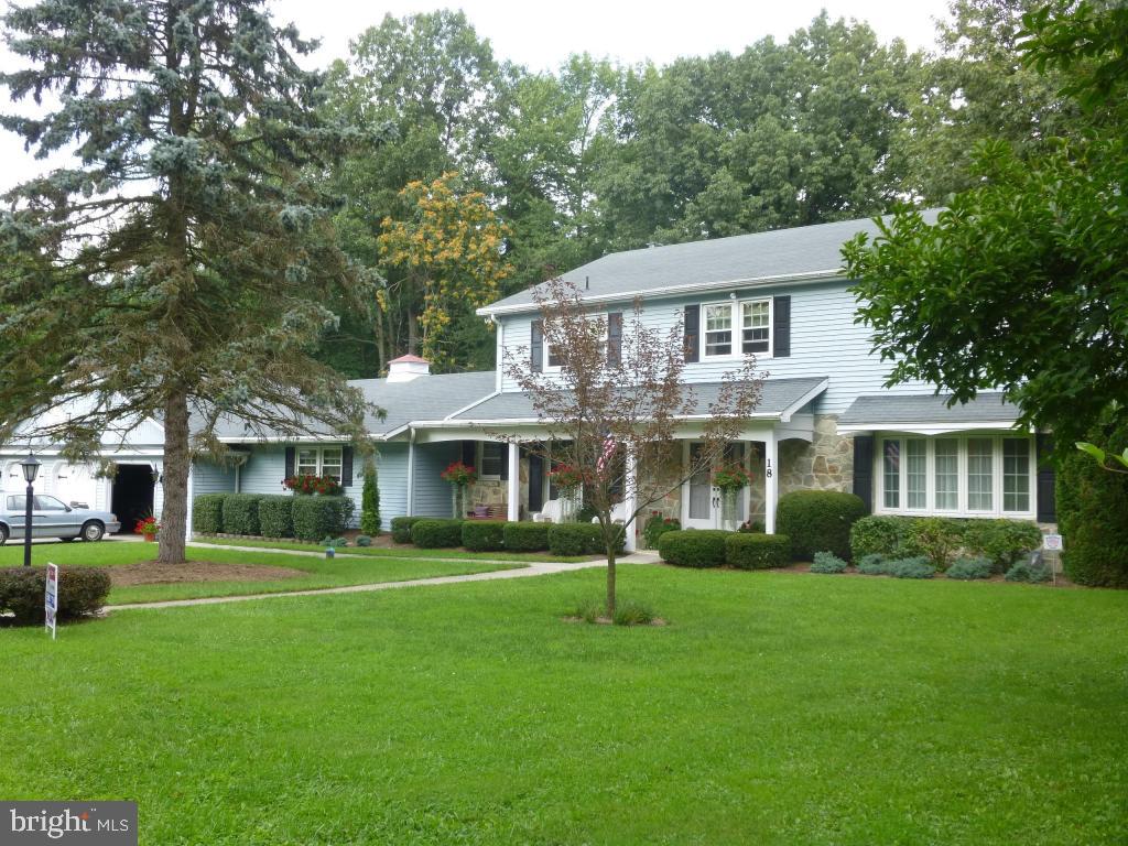 Privacy on 9 acres with 5 BR's, 3 BA's, country kitchen with solid surface countertops, Stone FP in family room with insert. Another brick FP in spacious Master BR. 3 car garage. In-ground pool with wonderful patio and pergola. Professionally landscaped. Decorative Iron fence surrounds solar heated pool.Economical Geothermal heat system.