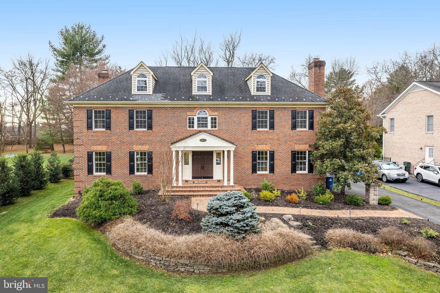 Welcome to 9425 Lakeside Drive, an exquisite Georgian-style home located in the prestigious Spring Lake community of Vienna, VA. This luxurious property offers an impressive 6,246 square feet of living space, featuring five bedrooms and five and a half bathrooms, designed to cater to your every need.

Upon entering, you are greeted by a grand foyer that sets the tone for the rest of the home. The main level includes a versatile office or bedroom with a full bath, ideal for guests or remote work. The spacious living areas are complemented by an enclosed patio with seating, perfect for year-round enjoyment.

The primary bedroom is a sanctuary, complete with a marble fireplace, dual walk-in closets, and a lavish en-suite bathroom. The additional bedrooms are generously sized, each offering ample closet space and en-suite bathrooms for ultimate convenience.

The home's two-zone heating and cooling system ensures comfort throughout the year. The expansive backyard is a true retreat, featuring an iron fence, a playground, and a deck with a hot tub, ideal for outdoor entertaining and relaxation.

Wine enthusiasts will appreciate the dedicated wine closet with a chiller, while fitness aficionados will enjoy the glass-enclosed workout room. The basement offers bonus rooms that can be customized to suit your lifestyle needs, whether it be a home theater, game room, or additional guest quarters.

Security and convenience are paramount, with features such as a Ring doorbell, exterior cameras and an iron-fenced backyard. The property is located near the serene Spring Lake, providing a picturesque setting and a sense of community.

This home embodies luxury living at its finest, offering a unique blend of elegance, comfort, and modern amenities. Do not miss the opportunity to make 9425 Lakeside Drive your new residence. Contact us today to schedule a private viewing and experience this exceptional property firsthand.