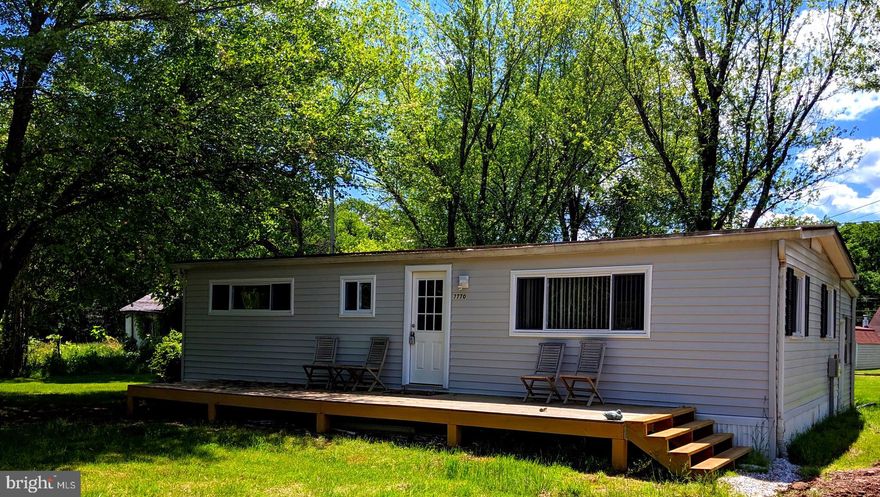 Live in a single family home on a half acre for the price of an apartment! Country living in a developing neighborhood. Presenting a beautifully remodeled single family home nestled behind Independence hill area of Manassas. With a nearly .4 acre lot, there's plenty of space to roam with a gravel driveway and a large shed. The home is gorgeous on the inside and offers a open front deck and oversized enclosed back porch perfect for relaxing.  The interior has been completely renovated top to bottom. New windows and doors, new carpet, new ceramic tile, completely remodeled kitchen, brand new appliances, new washer/dryer, new hot water heater, new hvac, new control panel for sewage pump, new deck, 2 ceiling fans, new front drywall and insulation, new disposal. Very close to community center and schools. Adjacent to Quantico Marine Corp Base. Its completely move-in ready and wold also work as an income property! The region recently invested over $15 Million in an animal shelter with many other projects underway. Get in now, before this up and coming neighborhood gets discovered!