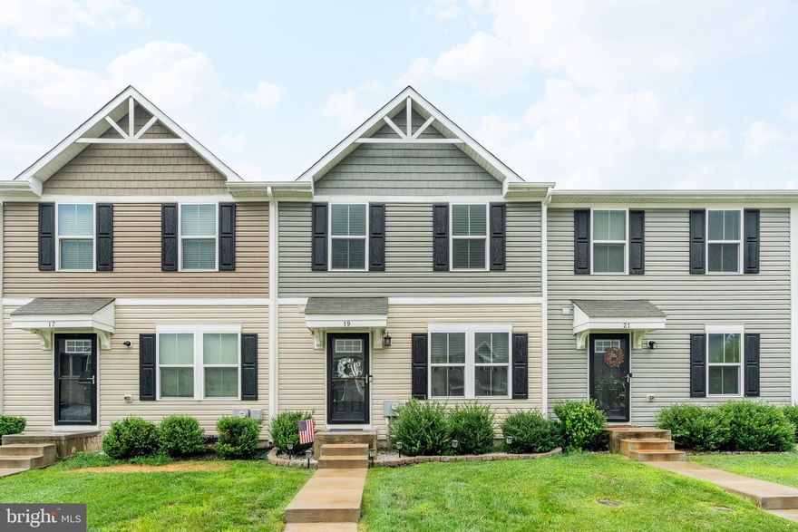 Welcome home to this move-in ready, newly constructed townhome built in 2019! Three full levels of living space. This 3 bedroom, 2.5 bath home features an open concept with a spacious family room and open kitchen. The kitchen boasts a center island, stainless steel appliances and a dining area. Glass sliding door in the kitchen offers lots of natural light and access to a large rear yard with horseshoe pits already set up and ready for entertaining. The upper level offers an owner's suite with a private bathroom and walk-in closet, plus 2 additional bedrooms and 2nd full bathroom. You will love the convenience of the 2nd-floor laundry. Finished lower level with egress window and rough-in for bathroom and an amazing built-in bar, just in time for football Sundays. This home is conveniently located near the Maryland/Delaware state line, major commuter routes, the University of Delaware, restaurants, and shopping.  HOA includes common area maintenance, lawn care, and trash service.