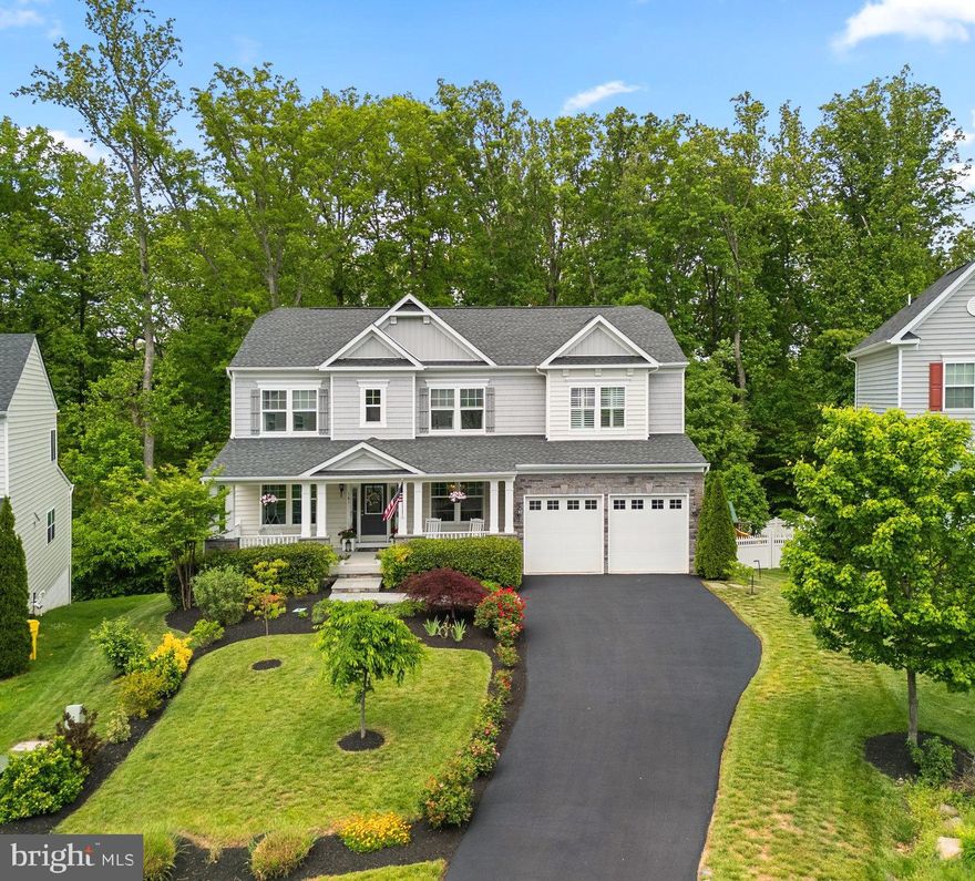 **OPEN HOUSE ON 5/17 CANCELED - Property is under contract** Nestled in Arnold's desirable Village of Stephen's Woods, this stunning Craftsman-style single-family home, built in 2017, is a must see for anyone who loves to entertain in style.  Boasting over 5,000 square feet across three finished levels, this spacious residence features 4 bedrooms and 3 full and 1 half bathrooms, along with high end designer touches throughout. Step onto the wide and welcoming front porch, complete with a charming porch swing – the perfect spot to unwind and enjoy the neighborhood ambiance. For more private relaxation, escape to the expansive rear screened porch, seamlessly flowing onto a composite deck that overlooks a serene backdrop of trees. The outdoor enjoyment continues with the walk-out finished basement level, where a paver patio, delightful gardens, and a cozy fire pit area await. Inside, you'll immediately appreciate the beautiful hardwood flooring, designer neutral paint palette, and an open-concept floorplan. The main level features formal living and dining rooms, ideal for entertaining, as well as a dedicated study or home office. The grand two-story great room serves as the heart of the home, showcasing a striking stack stone fireplace and opening seamlessly to the chef-inspired gourmet kitchen. For the true cooking enthusiast, the kitchen is complete with a large center island with seating, a casual dining area, and top-of-the-line Thermador cooking appliances and Sub-Zero refrigeration. Broadneck Blue Ribbon Schools. Easy commuter access via major routes and close to restaurants, shopping & entertainment. Schedule your private tour today!