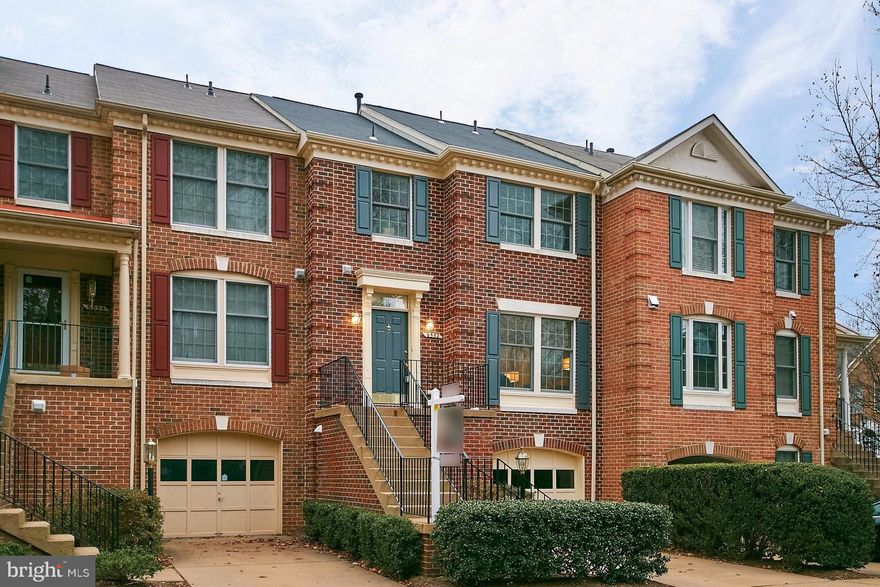 OPEN HOUSE SUNDAY, DECEMBER 10TH 1-4PM! MOVE FAST on this GORGEOUS TH, w/ 3 BR, 2 FULL, 2 HALF BA & GARAGE! Hardwoods throughout! All new carpet & paint!  KIT w/ granite counters, ss appliances, table space & french doors leading to deck!  MSTR STE w/ full BA w/ sep tub and showr w/ double vanity!  Walk-out LL w/ rec rm & wood burning FP!  GREAT COMMTR OPTIONS! ! BUS TO PENTAGON, SLUG LINES NEARBY