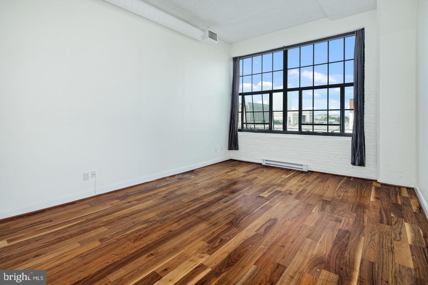 Great new price for exceptional loft in outstanding Fitler Sq. location! Easy access to just about anything a stylish, comfortable, well-balanced city life could possibly demand. One of the larger 1-bedroom footprints Locust Point Condominiums has to offer, and on a desirable floor with views, just below the penthouses! Clean, inviting open floor plan, 15ft ceilings, oversized windows, cityscape and river views. Warm cherry hardwoods throughout, sleek granite surfaces, island bar, pendant lighting, stainless appliances, ample kitchen cabinetry. Mezzanine loft-style bedroom, double built-in closets with built-in storage system. Freshly renovated marble bath, full-size tub, washer/dryer. Parking and extra storage included! Pet-friendly building, private, outdoor common area and fully enclosed dog lawn, fitness center, Indego bike station, and just 400ft from the lobby is THE mecca for the City?s most convenient running/biking trail (Schuylkill River Trail), as well as the Schuylkill River Park and not one, but two dog parks! An abundance of cafes, shops, restaurant options, all within half a mile of both Rittenhouse Sq. and the University of Pennsylvania. These units don?t turn over often, because life here provides just about everything you need - be sure to move this award-winning building to the top of your list! (Please note this is a non-smoking building.)