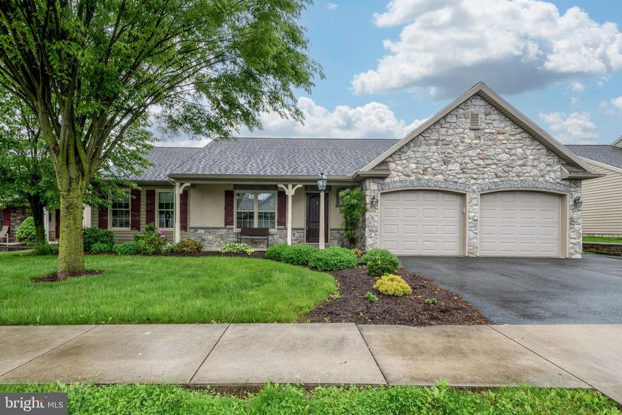 Enjoy one-floor living in this well-maintained ranch home in Brookshire 55+ neighborhood, just outside of Manheim. Open floorplan with vaulted ceiling, gas fireplace, upgraded flooring, upgraded kitchen countertops and appliances and a lovely, covered patio with privacy are some of the highlights of this home. With exterior design accents, there is great curb appeal, plenty of beds for gardening and a covered front porch, offering a peaceful place to sit. Brookshire offers easy walkability with sidewalks, a community center and a pond with a view. Just a mile to the local shopping center and a couple miles to downtown Manheim -great location! Review listing documents for more information on the monthly land lease and HOA.