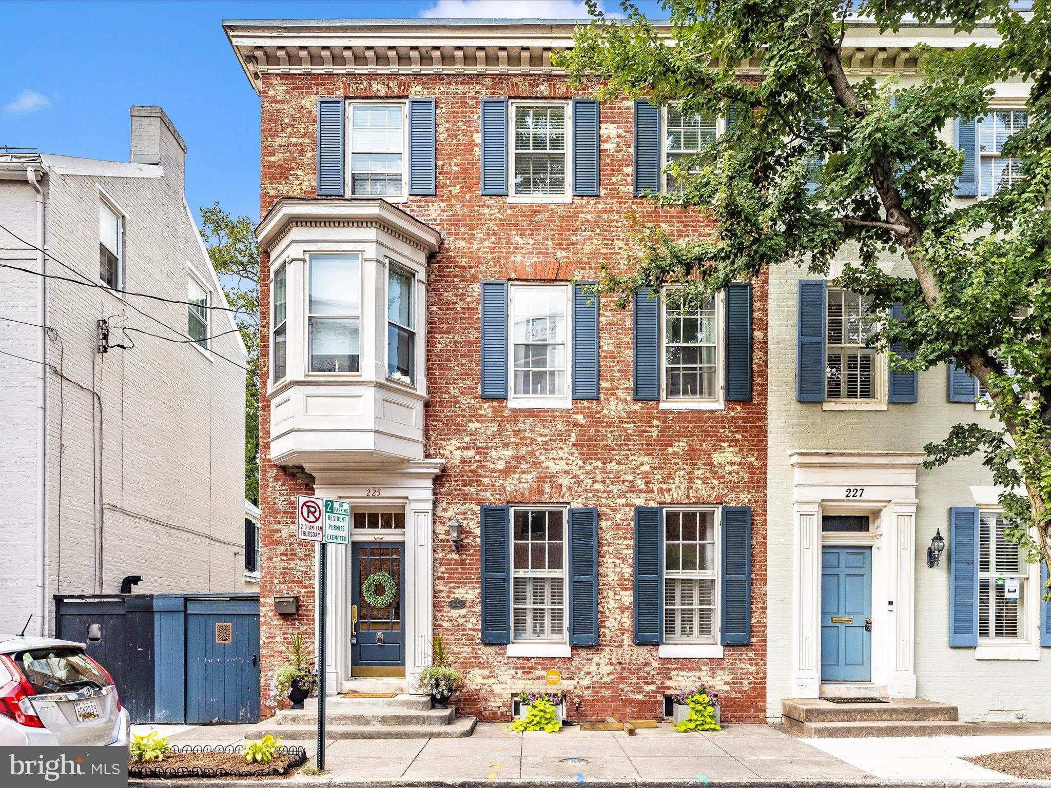 Rare opportunity to own this prestigious historic end-unit townhome in the heart of vibrant downtown Frederick! This beautifully preserved landmark blends timeless architecture with modern updates, featuring classic moldings, hardwood floors, soaring ceilings, and abundant natural light. The formal living room offers exposed brick and fireplace, while the dining room includes custom built-ins and wine fridge. The renovated chef’s kitchen is appointed with stainless steel appliances, granite counters, center island, wall oven, gas range, microwave drawer, skylight, and custom cabinetry, all opening to a professionally designed courtyard with koi pond, stone bar, and seating wall. The main level includes a spacious bedroom, office, and full bath—ideal for an in-law suite. The luxurious primary suite is a true retreat, featuring exposed brick and a fireplace with a spa-inspired en-suite bath with a charming bay window seat. The suite also boasts thoughtfully designed his-and-her closets: a stunning custom dressing room for her, complete with built-ins, glass-front cabinetry, and elegant display shelving, and a separate walk-in closet for him with tailored storage solutions. Every detail has been curated for style, comfort, and functionality. Additional bedrooms, full baths, laundry, office, bonus room, and private balcony complete the upper levels. Exterior highlights: fenced courtyard, 2-car detached garage, 3 additional parking spaces, and 2 paid street parking spaces—a rare amenity for downtown living!
Located steps from the new Visitation Hotel and Wye Oak Restaurant, and walking distance to Carroll Creek, restaurants, shops, parks, and theaters. Easy access to I-70, I-270, Route 40, and MD-180.