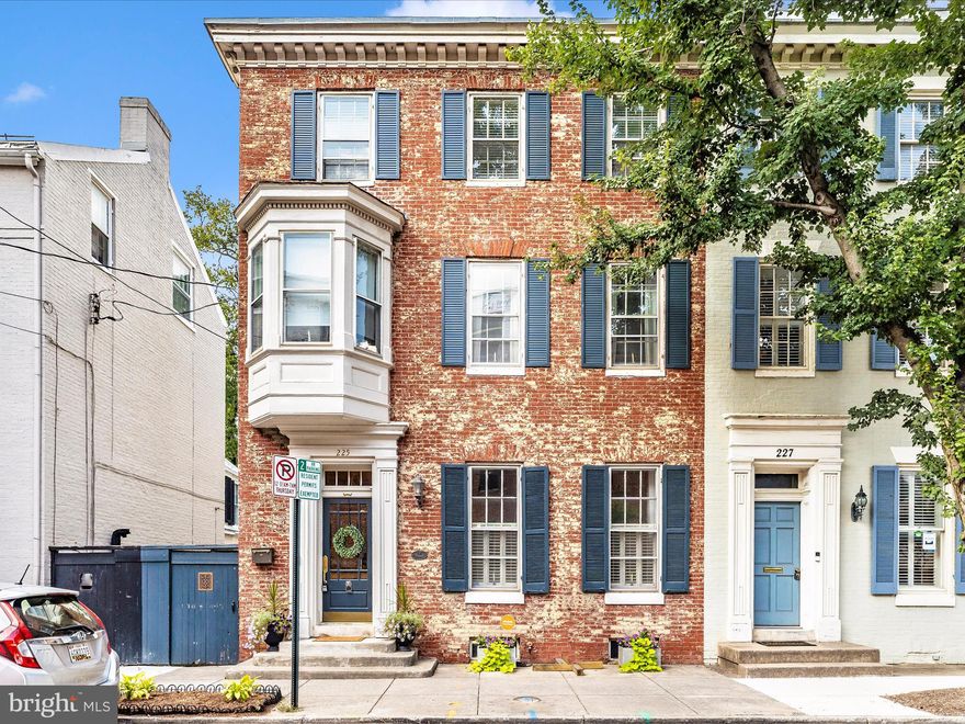 New price makes this historic downtown gem an unbeatable value and rare opportunity to own a  prestigious historic end-unit townhome in the heart of vibrant downtown Frederick. This beautifully preserved landmark blends timeless architecture with modern updates, featuring classic moldings, hardwood floors, soaring ceilings, new roof,  and abundant natural light. The formal living room offers exposed brick and a fireplace, while the dining room showcases custom built-ins and a wine fridge. The renovated chef’s kitchen boasts stainless steel appliances, granite counters, center island, wall oven, gas range, microwave drawer, skylight, and custom cabinetry—all opening to a professionally designed courtyard with koi pond, stone bar, and seating wall.
The main level includes a spacious bedroom, office, and full bath—perfect for an in-law suite. Upstairs, the luxurious primary suite is a true retreat, featuring exposed brick, fireplace, and a spa-inspired bath with a charming bay window seat. Thoughtfully designed his-and-her closets include a stunning custom dressing room for her with built-ins, glass-front cabinetry, and elegant display shelving, plus a separate walk-in closet for him with tailored storage solutions.
Additional bedrooms, full baths, laundry, office, bonus room, and private balcony complete the upper levels. Exterior highlights include a fenced courtyard, 2-car detached garage, 3 additional parking spaces, and 2 paid street parking spaces—a rare amenity for downtown living!
All just steps from the new Visitation Hotel and Wye Oak Restaurant, and walking distance to Carroll Creek, restaurants, shops, parks, and theaters. Easy access to I-70, I-270, Route 40, and MD-180.