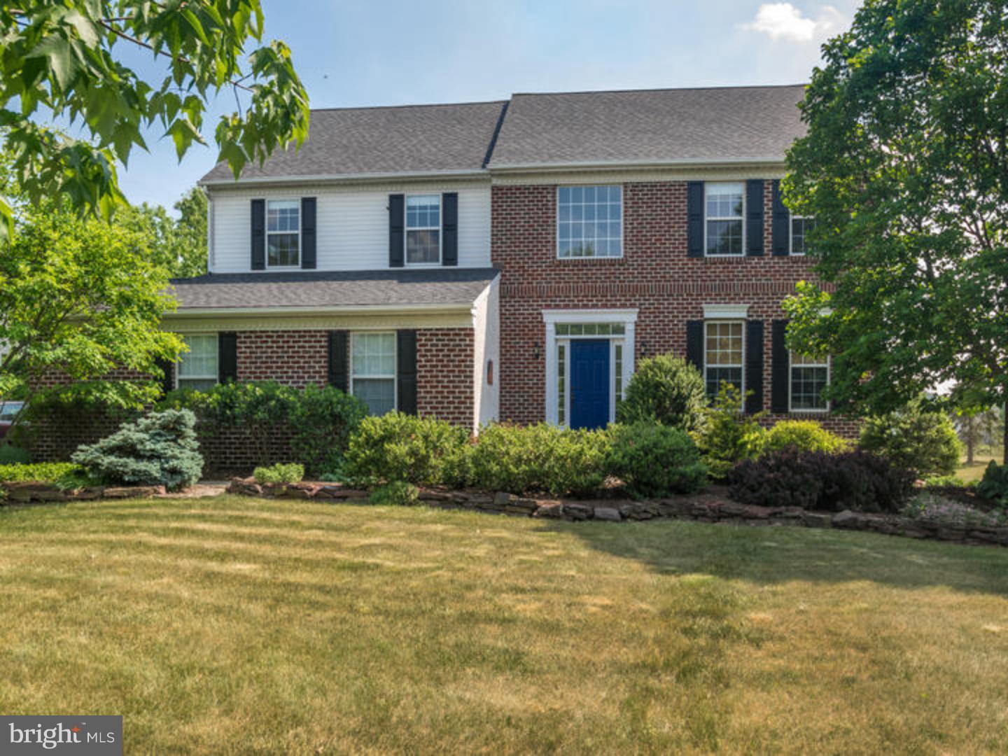 A Beautifully landscaped, private yard is just the beginning of this Classic Colonial Home! Located in the sought after neighborhood of Homestead the entire property is very private w/custom plantings, many mature trees, stone accented flower beds & custom EP Henry pavers that create all sorts of outdoor spaces for your relaxation! It all starts with the 2-Story entry foyer that has NEW gleaming hardwood floors, a large picture window & transoms surrounding the front door that let all the sunshine in! The Formal Living & Dining Rooms have NEW gleaming hardwood floors, crown molding & chair rail. The Expanded Chef inspired kitchen has upgraded 42" cabinetry w/wood molding accents, an expanded island, hardwood floors & 3" wood baseboard molding for a furniture styled finish. There is a large picture window, stainless steel double bowl sinks, pantry, under cabinet & extra recessed lighting & appliances to include a gas stove, NEW Refrigerator, Dishwasher, Built-in Microwave & Garbage Disposal. The Breakfast Area has oversized patio doors that lead to a spacious, two tiered EP Henry Paver Patio that overlooks the private backyard. The Family Room has a wood fired, Slate & Custom Wood accented fireplace, NEWER carpeting, an oversized triple window, overhead lighting & a ceiling fan light fixture. There is a spacious laundry/mud room w/upgraded matching cabinetry, a laundry tub, a front-load washer, a gas dryer & an outside exit to the side yard. The garage is an oversized two car w/additional shelving for tools & storage. The tree lined yard has many custom plantings, stone accents around the gardens, paver walkways, raised bed vegetable gardens & fruit trees! The Master Suite is located privately away from the other bedrooms w/its own private bath & a spacious walk-in closet. The oversized Master Bath has vaulted ceilings, tile floors an oversized shower & separate soaking tub. All the other bedrooms are spacious & have oversized closets, ceiling fan light fixtures & are freshly painted. Don't miss these special features: NEW paint throughout, 9' ceilings on the 1st floor & in the Basement, NEW Gleaming Hardwood Floors, NEWER Carpet, NEW 30 year Roof-March 2014, NEW 50G water heater, NEW hardwired smoke alarms & a NEW Refrigerator . Convenient to schools, Rt 309, Turnpike & a short walk to shopping provides even more convenience while still being in one of the most desirable locations in Montgomery county!