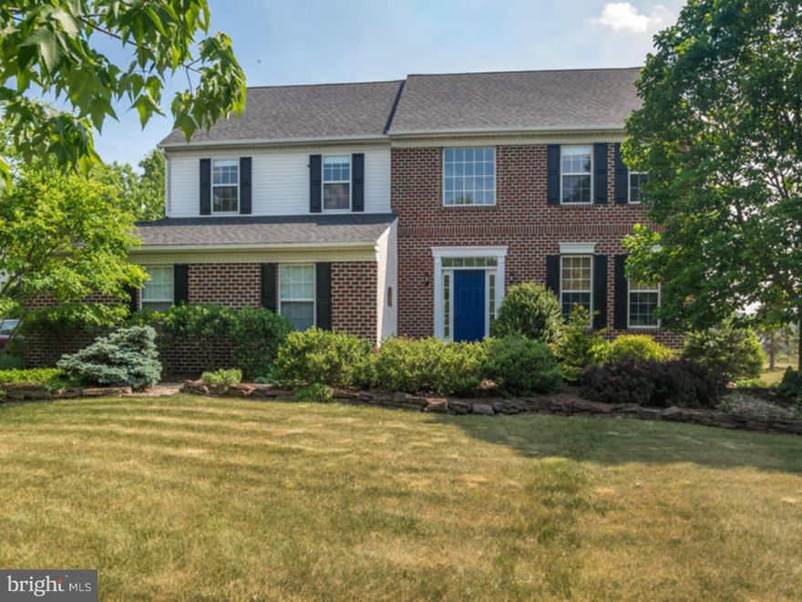A Beautifully landscaped, private yard is just the beginning of this Classic Colonial Home! Located in the sought after neighborhood of Homestead the entire property is very private w/custom plantings, many mature trees, stone accented flower beds & custom EP Henry pavers that create all sorts of outdoor spaces for your relaxation! It all starts with the 2-Story entry foyer that has NEW gleaming hardwood floors, a large picture window & transoms surrounding the front door that let all the sunshine in! The Formal Living & Dining Rooms have NEW gleaming hardwood floors, crown molding & chair rail. The Expanded Chef inspired kitchen has upgraded 42" cabinetry w/wood molding accents, an expanded island, hardwood floors & 3" wood baseboard molding for a furniture styled finish. There is a large picture window, stainless steel double bowl sinks, pantry, under cabinet & extra recessed lighting & appliances to include a gas stove, NEW Refrigerator, Dishwasher, Built-in Microwave & Garbage Disposal. The Breakfast Area has oversized patio doors that lead to a spacious, two tiered EP Henry Paver Patio that overlooks the private backyard. The Family Room has a wood fired, Slate & Custom Wood accented fireplace, NEWER carpeting, an oversized triple window, overhead lighting & a ceiling fan light fixture. There is a spacious laundry/mud room w/upgraded matching cabinetry, a laundry tub, a front-load washer, a gas dryer & an outside exit to the side yard. The garage is an oversized two car w/additional shelving for tools & storage. The tree lined yard has many custom plantings, stone accents around the gardens, paver walkways, raised bed vegetable gardens & fruit trees! The Master Suite is located privately away from the other bedrooms w/its own private bath & a spacious walk-in closet. The oversized Master Bath has vaulted ceilings, tile floors an oversized shower & separate soaking tub. All the other bedrooms are spacious & have oversized closets, ceiling fan light fixtures & are freshly painted. Don't miss these special features: NEW paint throughout, 9' ceilings on the 1st floor & in the Basement, NEW Gleaming Hardwood Floors, NEWER Carpet, NEW 30 year Roof-March 2014, NEW 50G water heater, NEW hardwired smoke alarms & a NEW Refrigerator . Convenient to schools, Rt 309, Turnpike & a short walk to shopping provides even more convenience while still being in one of the most desirable locations in Montgomery county!
