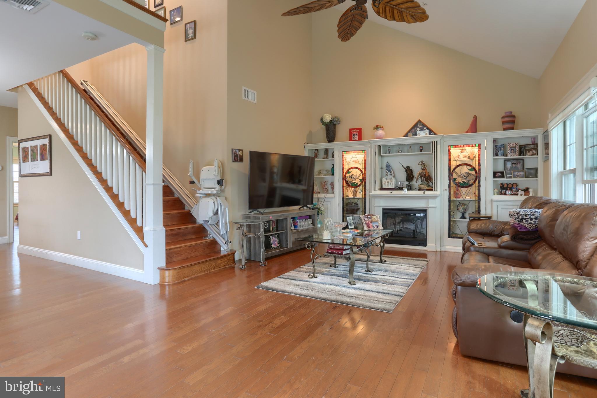 Stunning, end of row townhome in the Derry Township School District! This immaculate 2-bedroom, 2.5 bath townhome is a must see! As you walk in the front door you will be amazed at the beautiful living area with white built in cabinets and shelves with (commissioned) stain glass doors and an electric fireplace. There is lighting behind the stained glass as well as a cabinet to hide the TV. Speakers are built into the ceiling for music throughout the home. The dining room leads into the kitchen with tile flooring, a built-in bench to enjoy breakfast, laundry access, and a door that leads to the back patio. Beautiful hardwood floors throughout dining and living room and half bath! The Master suite features a large open closet with shelves that leads into the master bath that has a deeper soaking tub, double vanity and a separate standalone shower. The second floor has a spacious loft area that can be used as an office, home gym, recreational space, or could be converted to a third bedroom. It also features a second master bedroom with a large open closet, and a full bath with a standalone shower. This home also has a detached, oversized 2-car garage. The HOA covers landscaping, snow removal, trash, recycling, water, sewer, common areas, exterior maintenance and the fitness/community center! Do not miss the opportunity to see this home close to the Hershey Medical Center, making it an excellent rental.